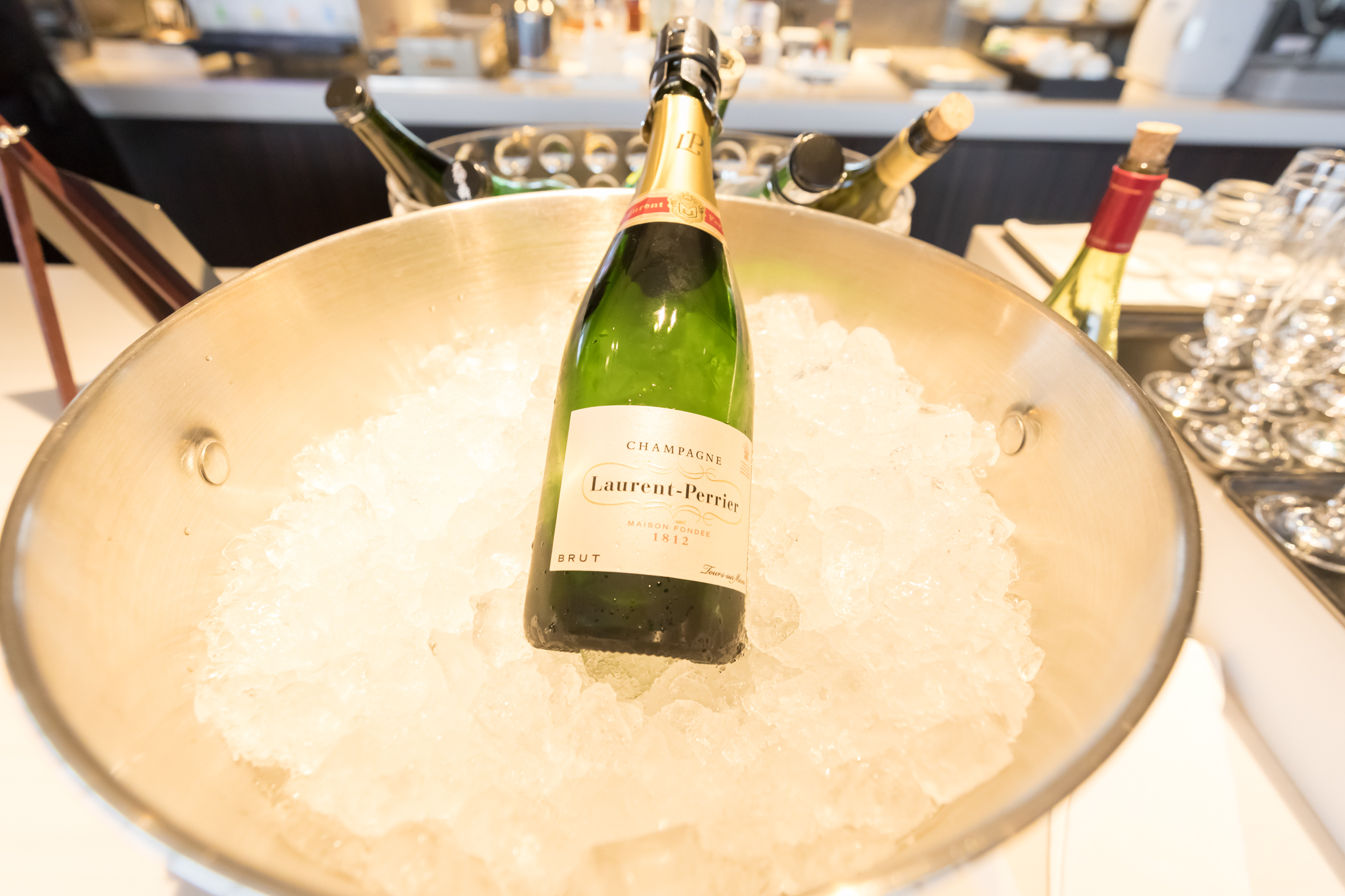 a bottle of champagne in ice bucket