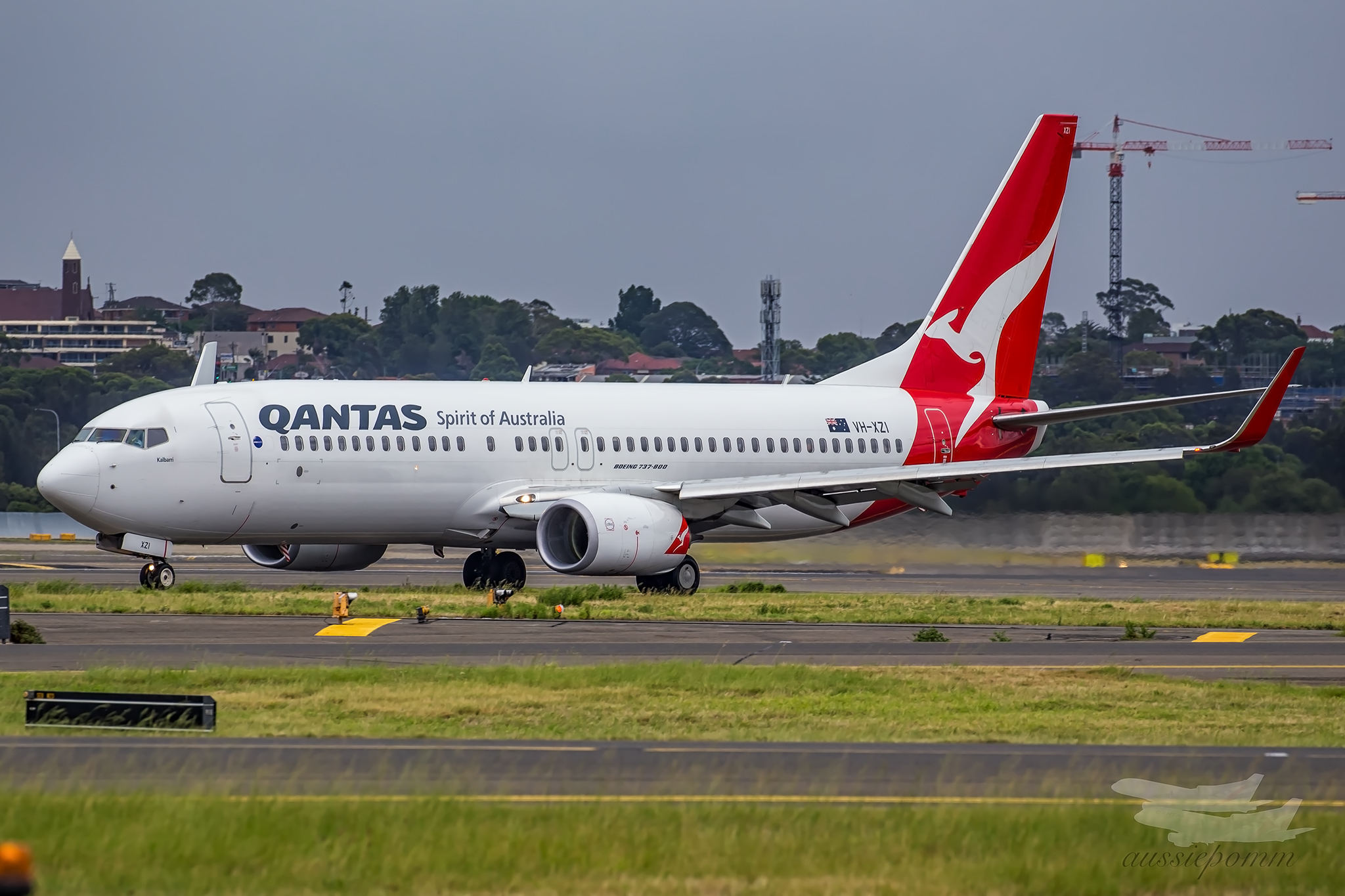 a white airplane on a runway