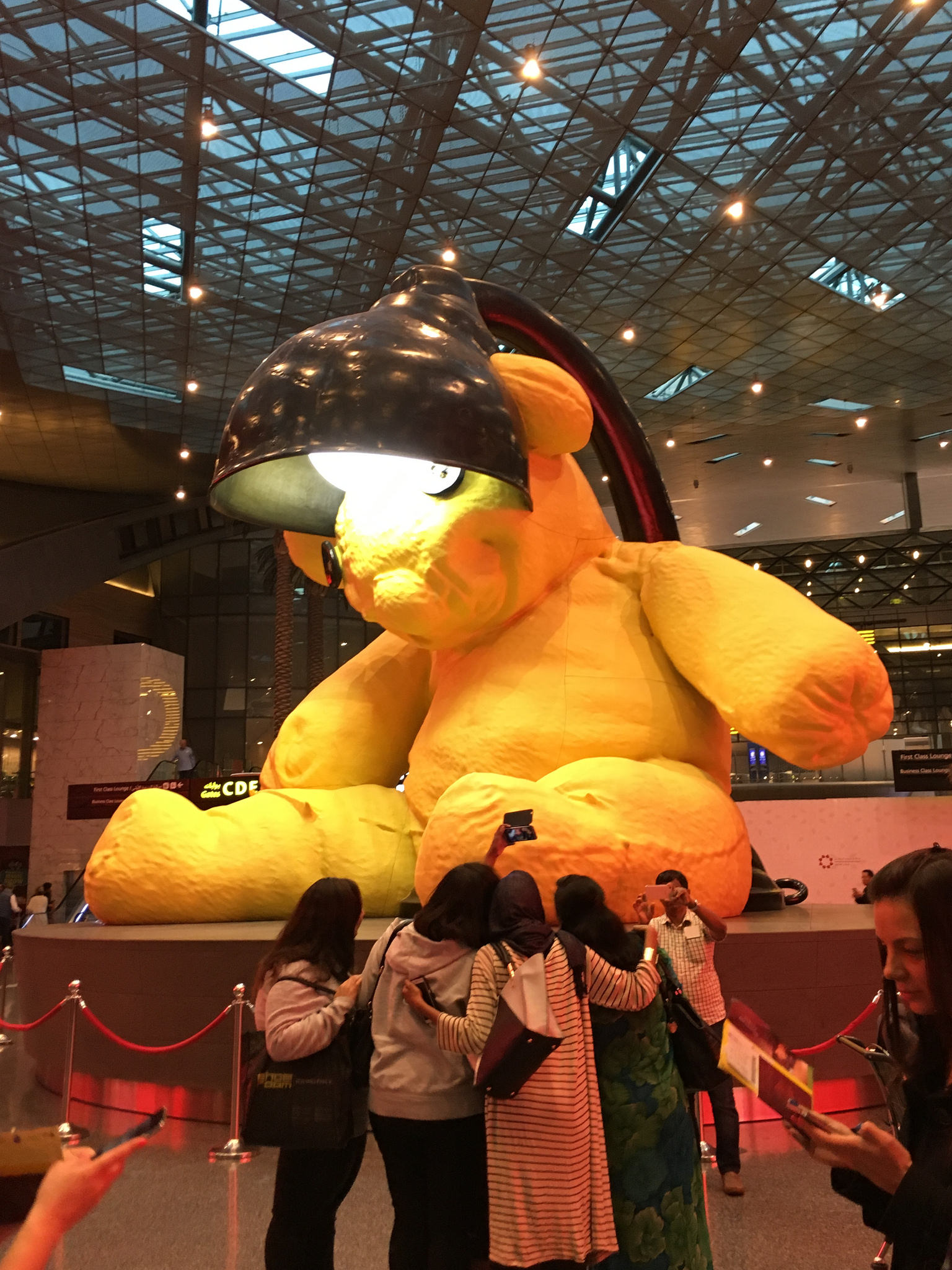 a large stuffed animal with a lamp on its head