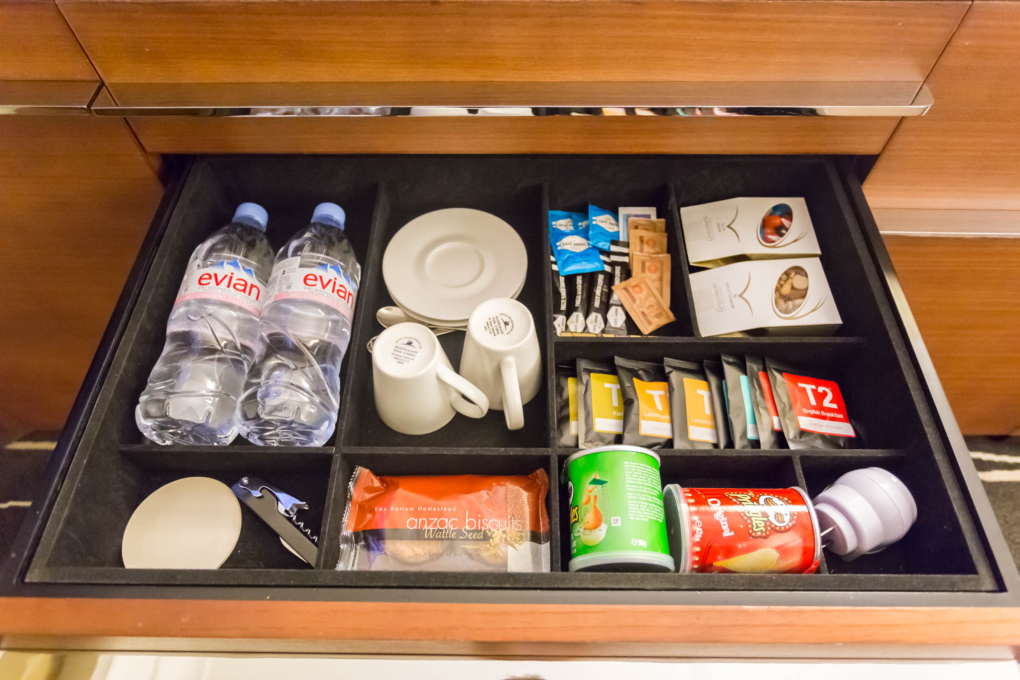a drawer with a variety of items inside