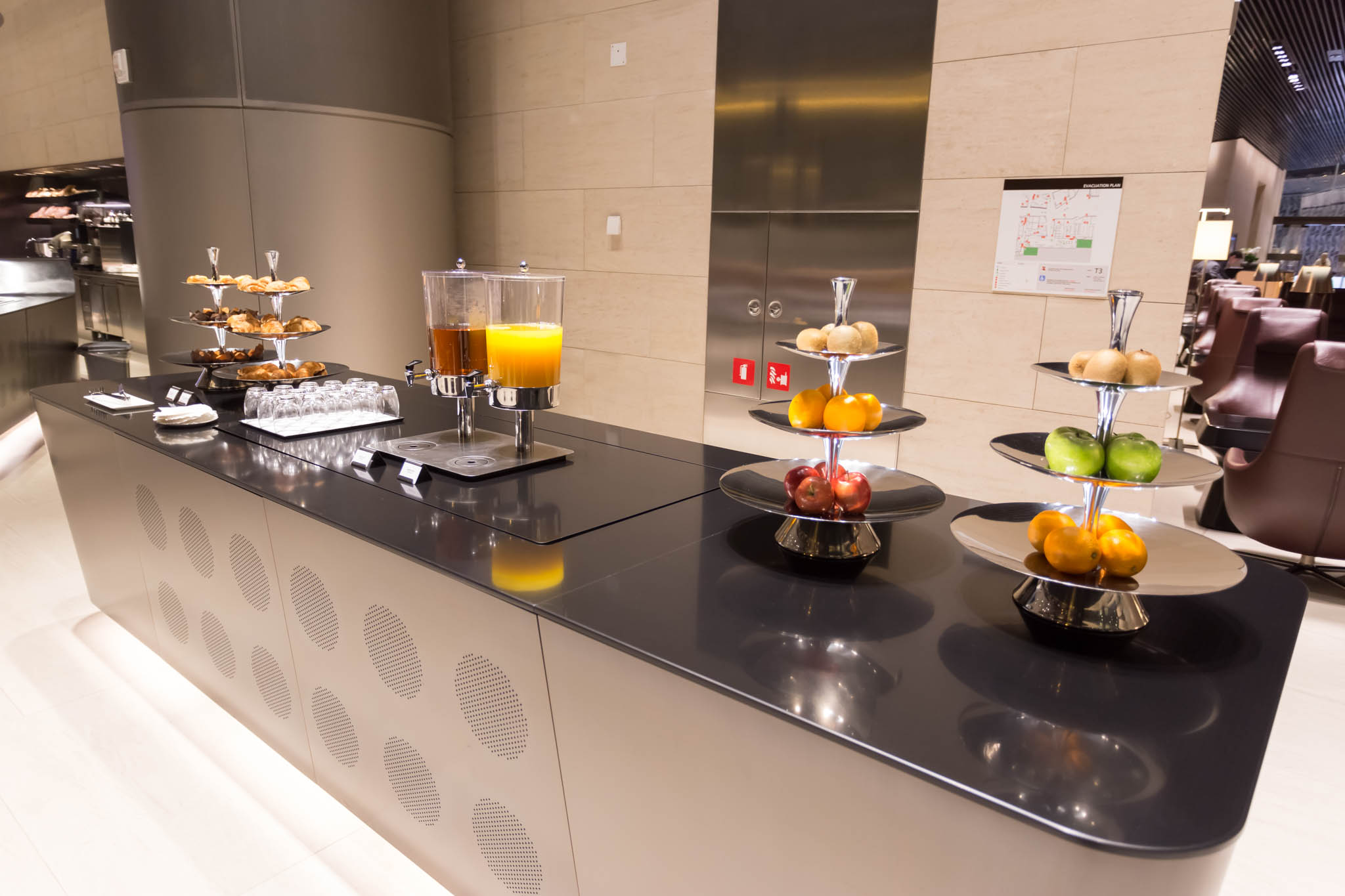 a group of plates of food on a counter