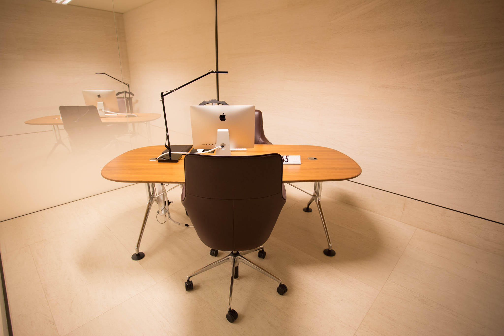 a desk with laptops on it