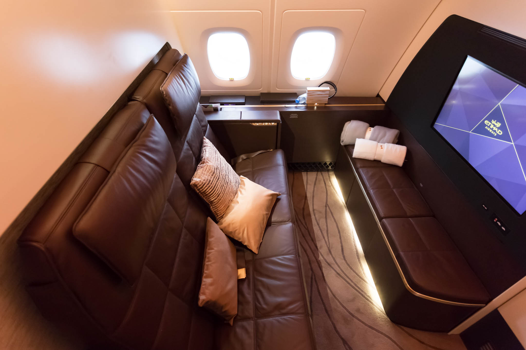 a leather couch in a plane
