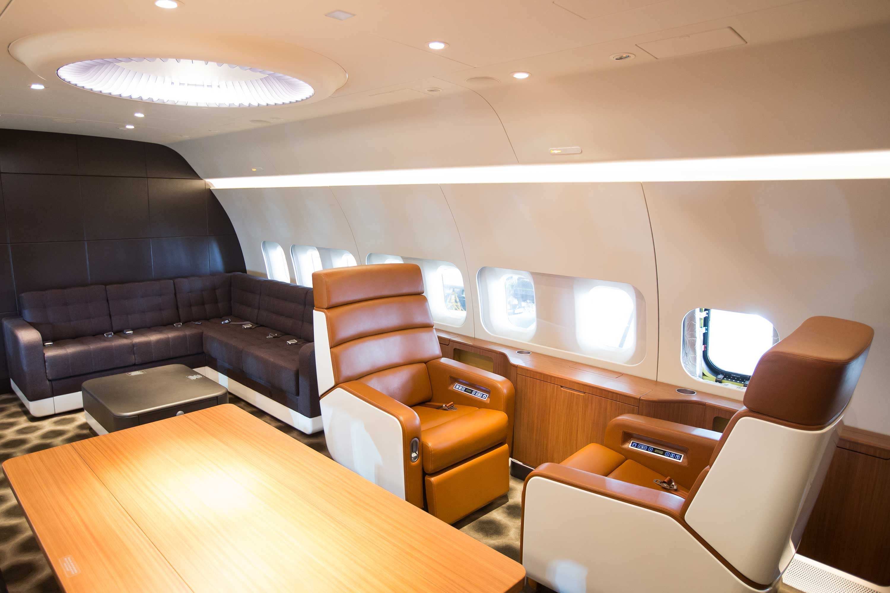 a plane with a table and chairs