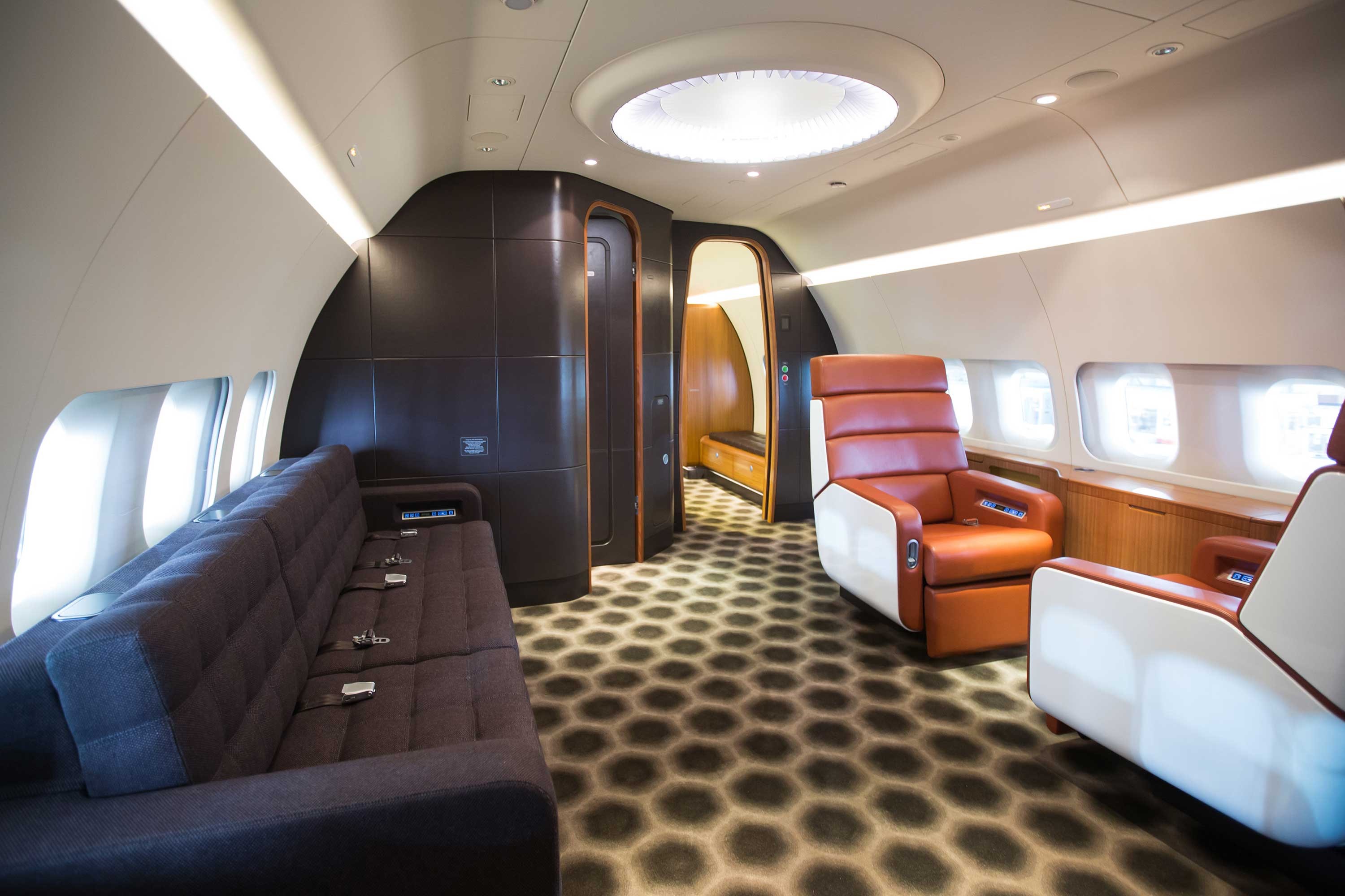 a couch and chair in a plane