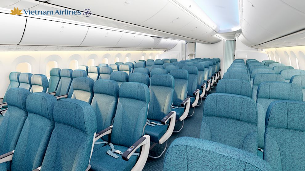 a row of blue seats in an airplane