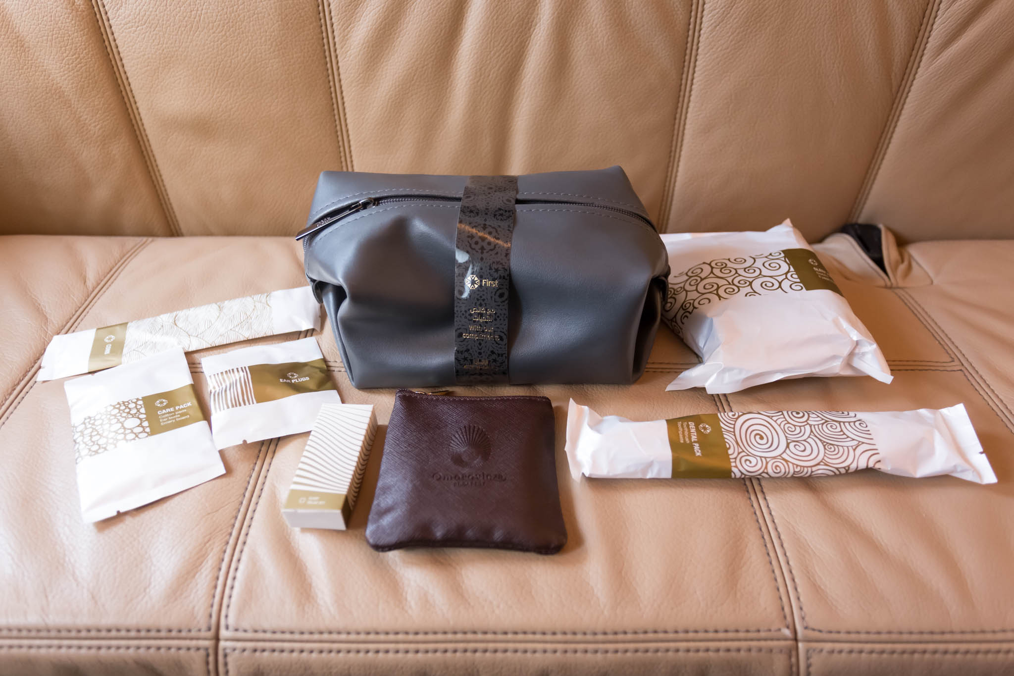 a bag and other items on a couch