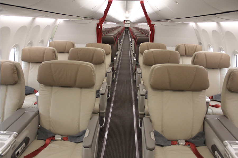 the inside of an airplane with seats