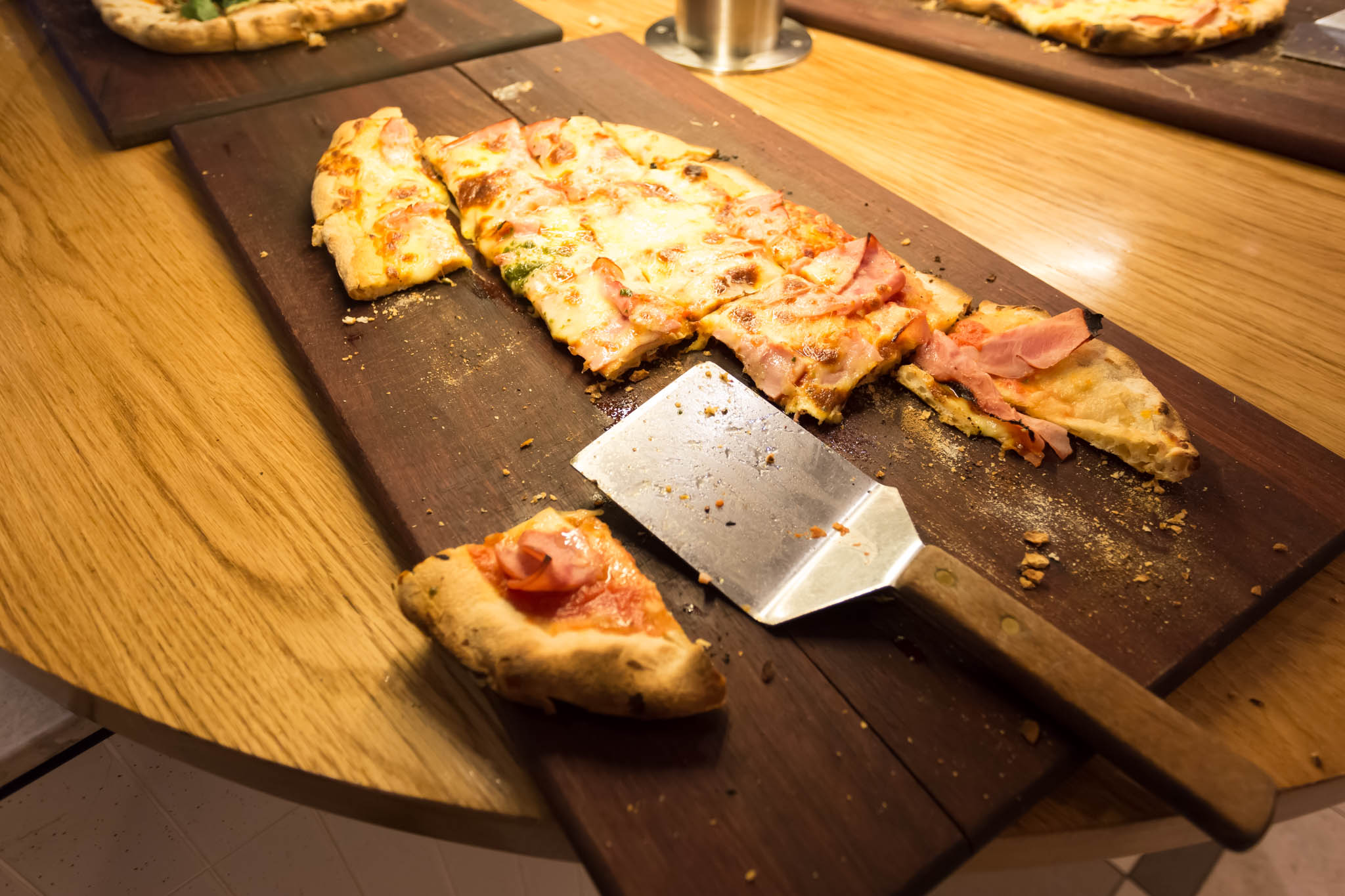 a pizza on a cutting board