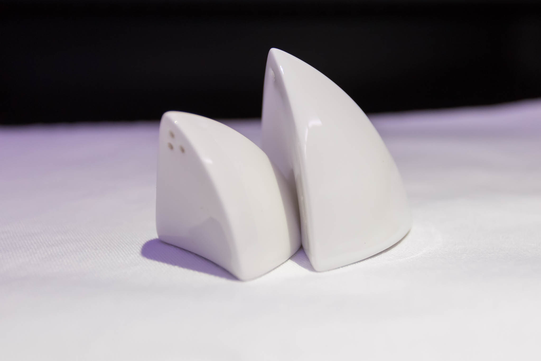 a salt and pepper shakers on a table