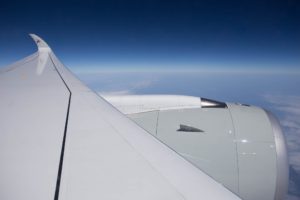 an airplane wing and the sky
