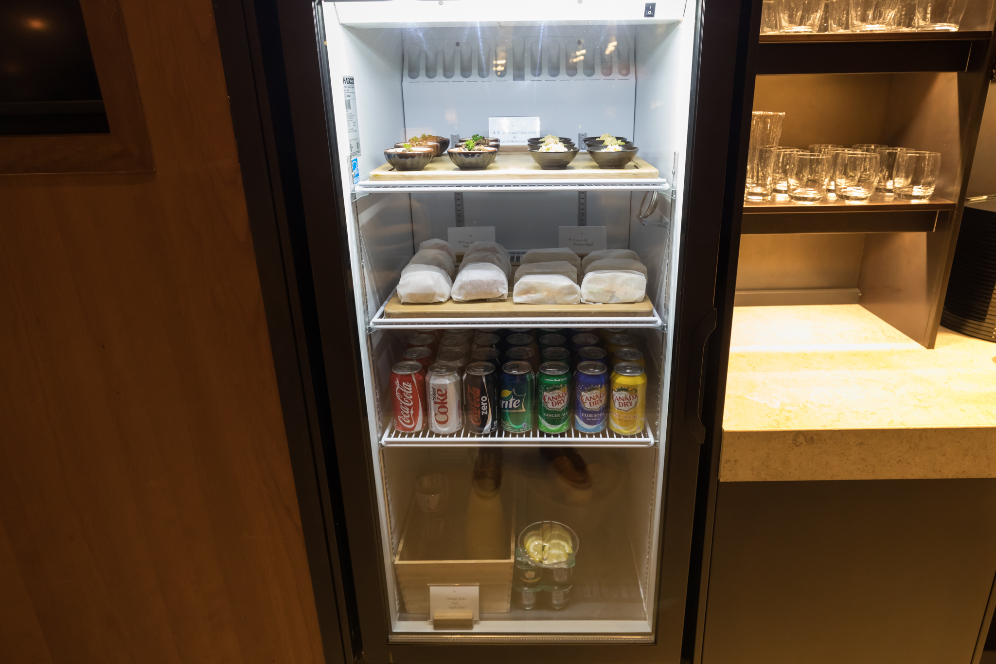 a refrigerator with food and drinks