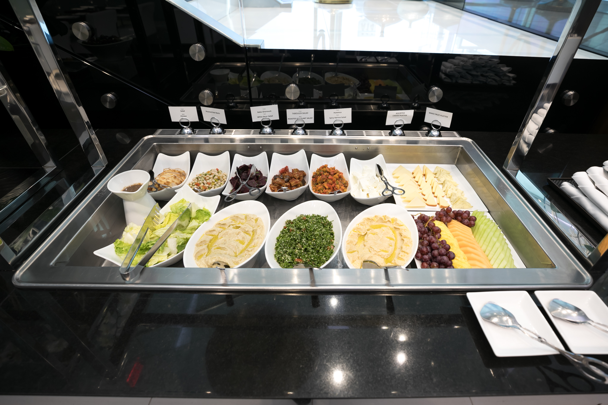 a tray of food in a buffet