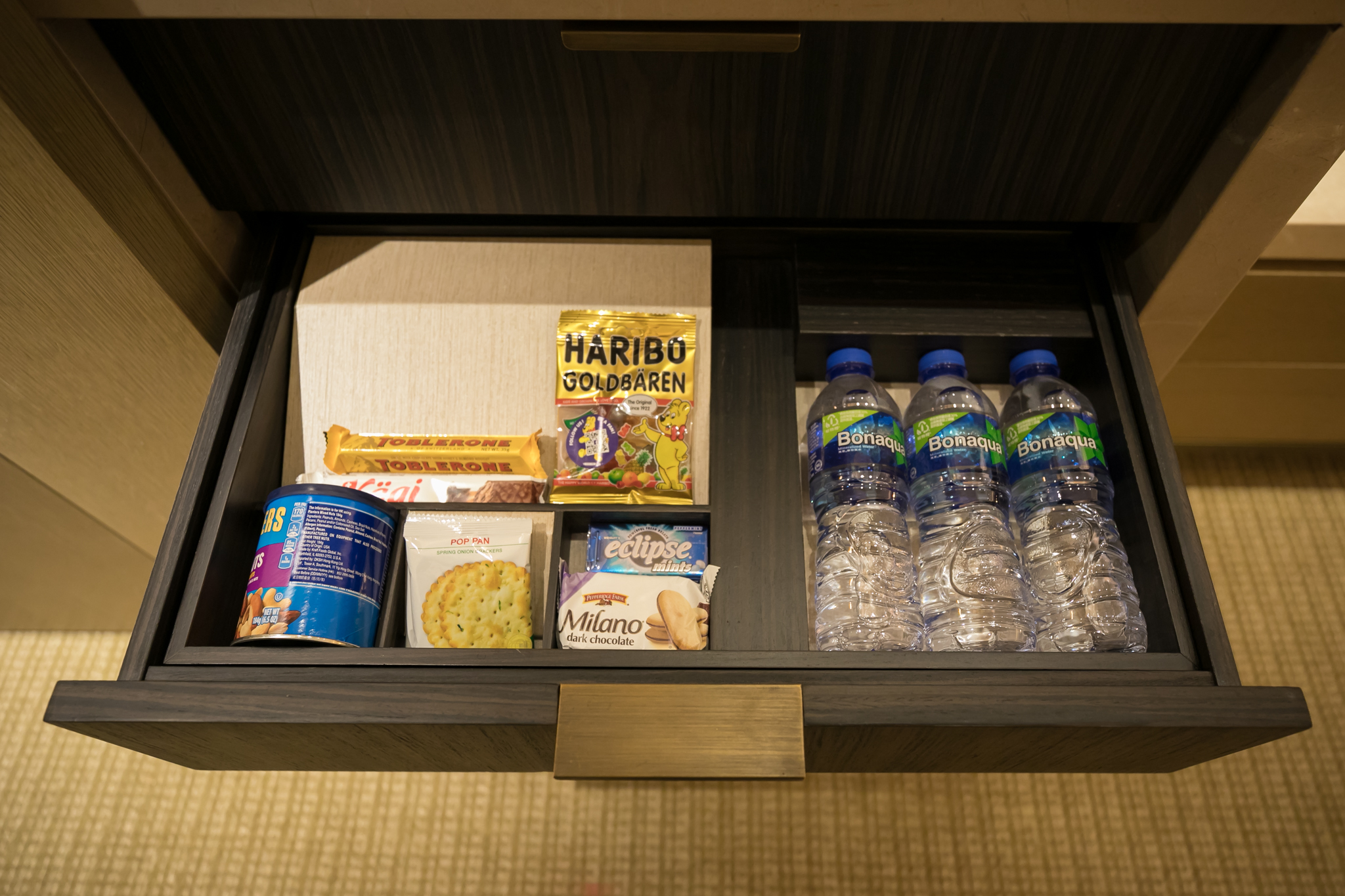 a drawer with food and drinks