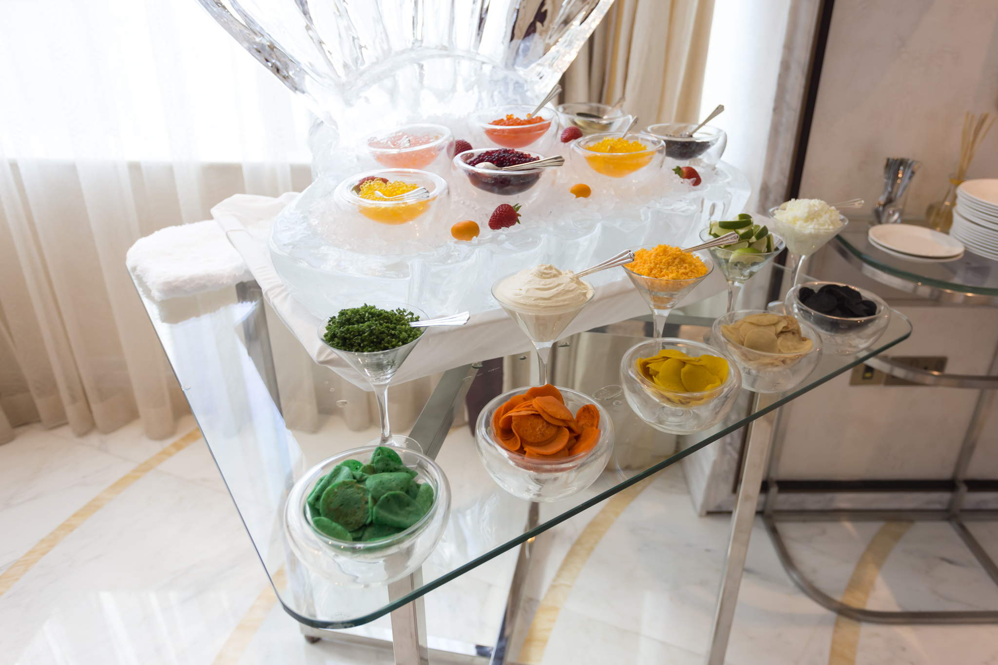 a table with ice and different colored food