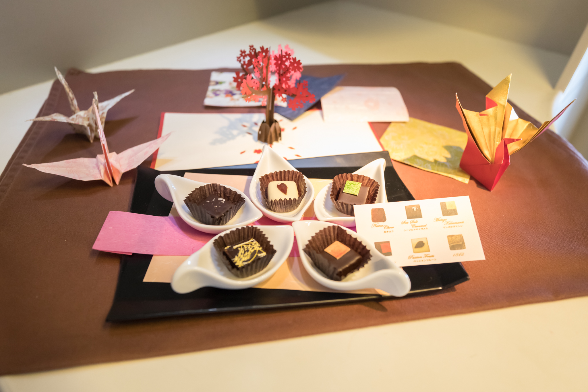 a plate of chocolates on a table