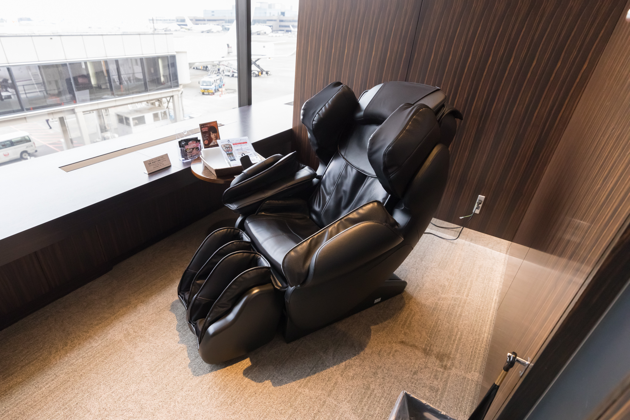 a black massage chair in a room