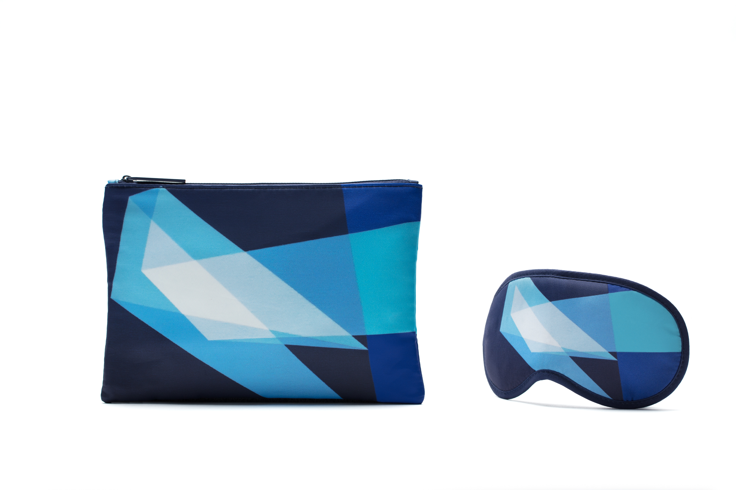 a blue and white bag and eye mask
