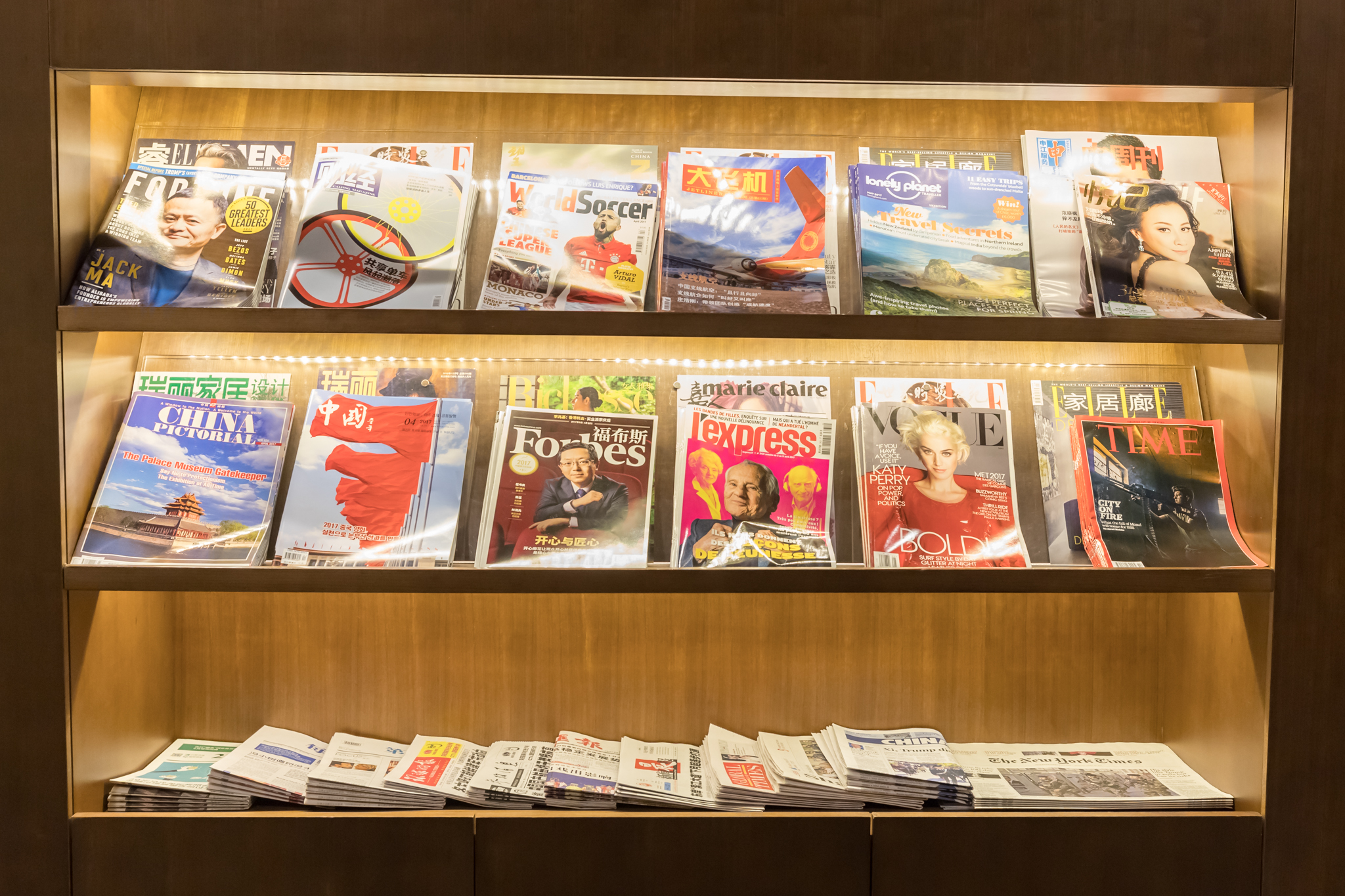a shelf with magazines on it