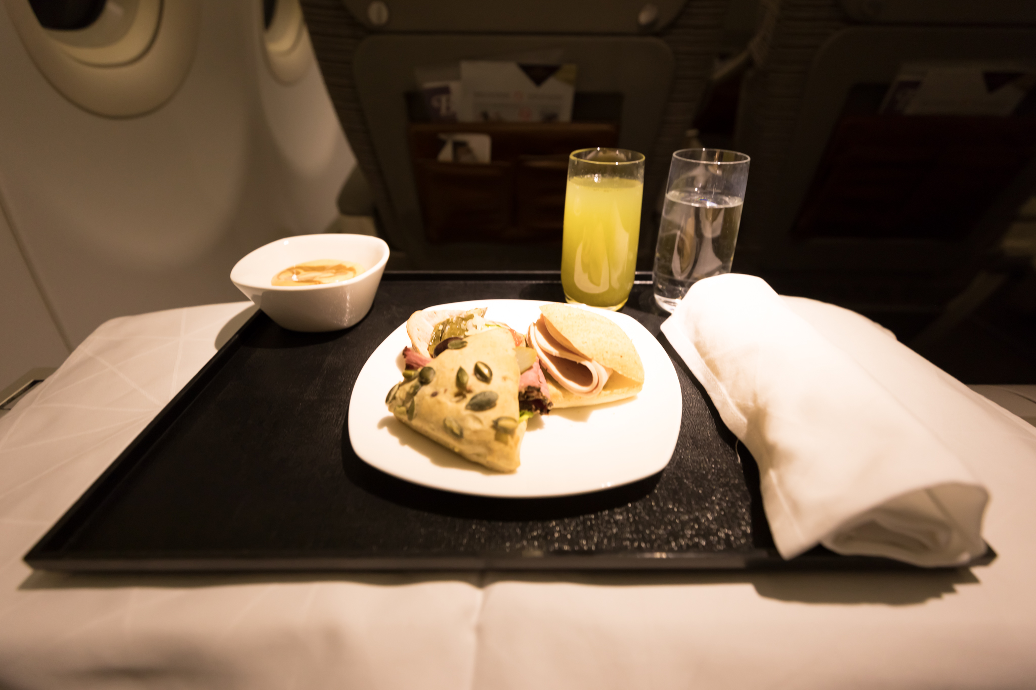 food on a tray on a plane