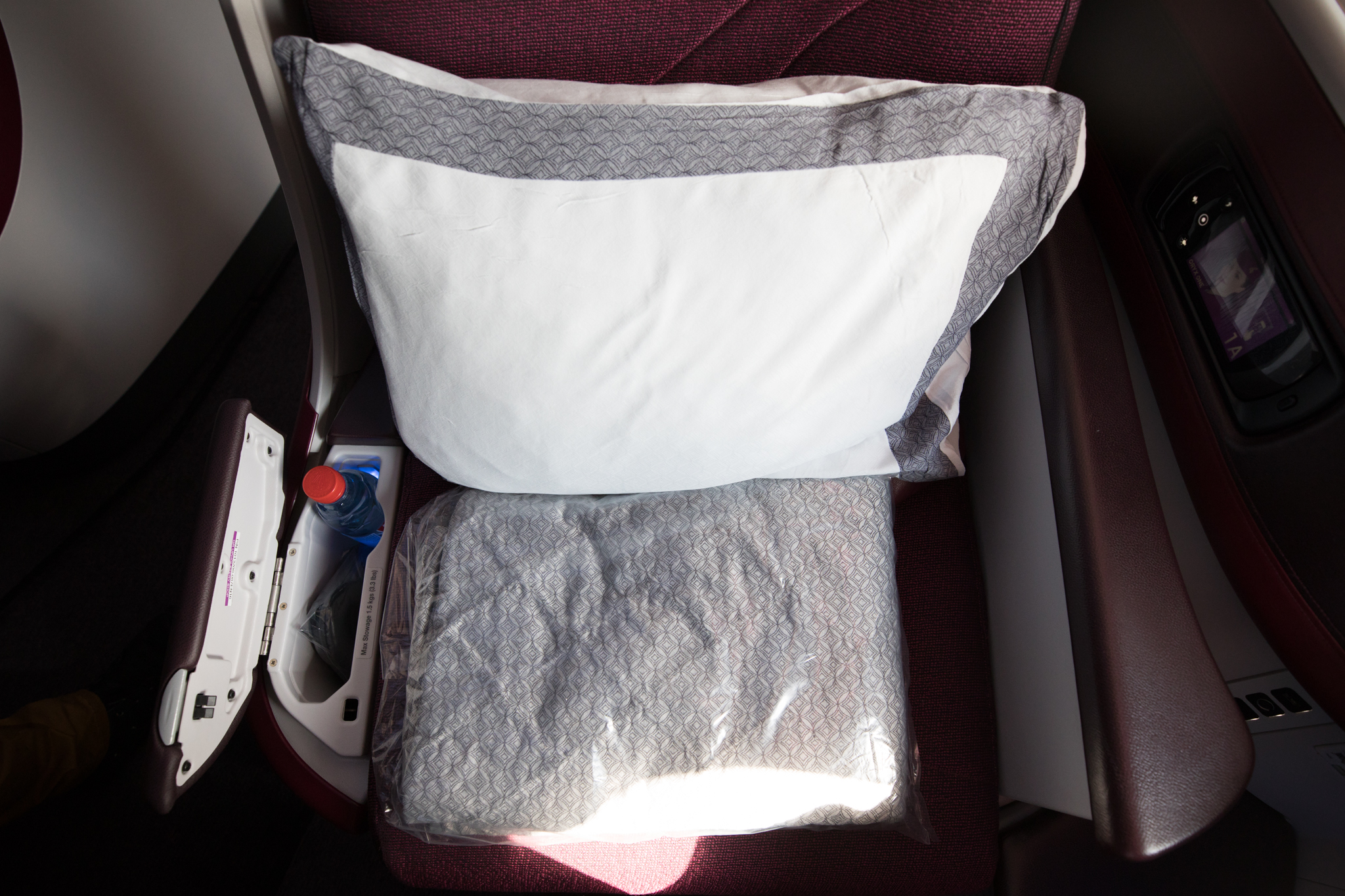 a pillow and a pillow on a seat