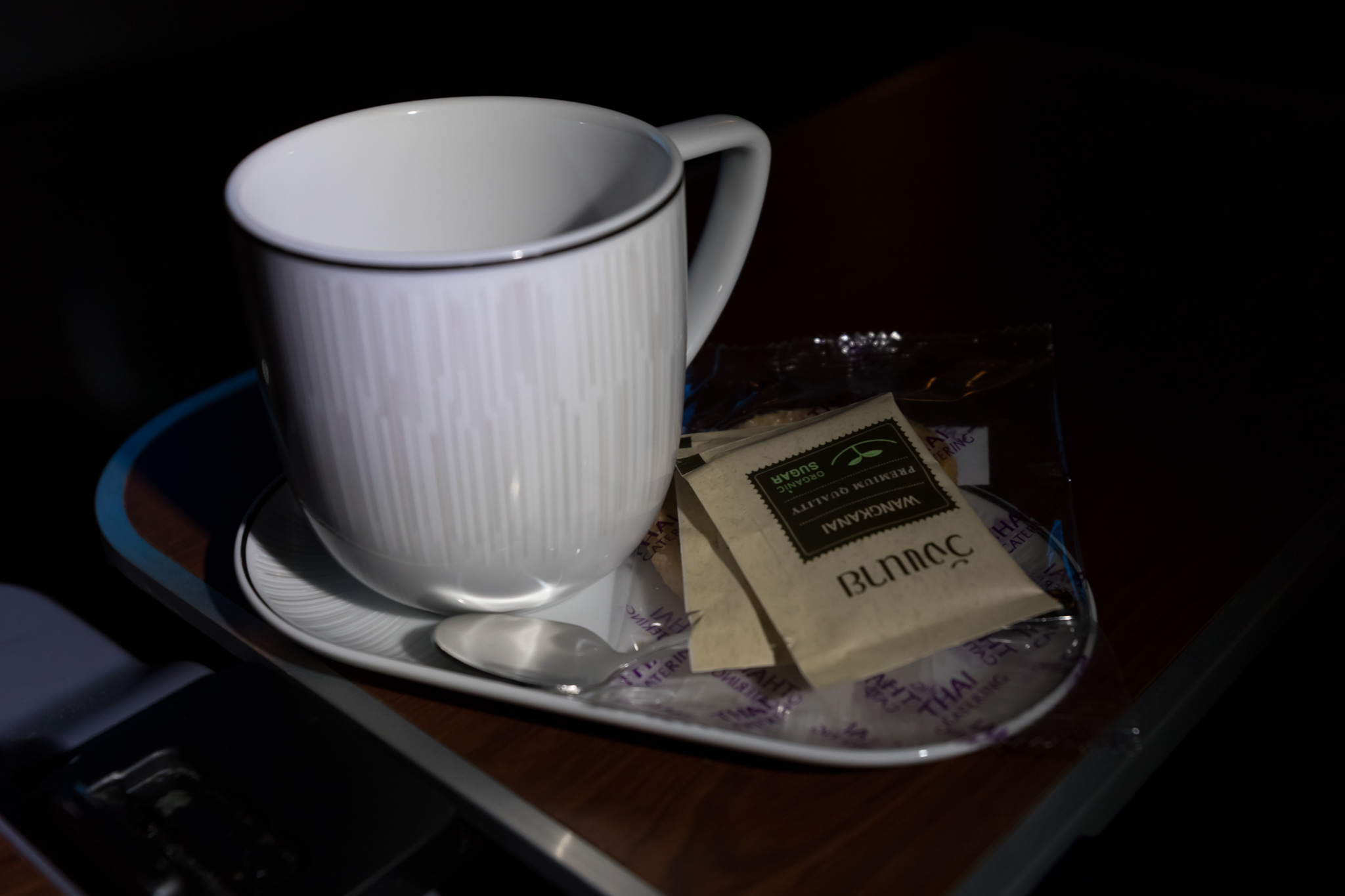 a cup and saucer on a tray