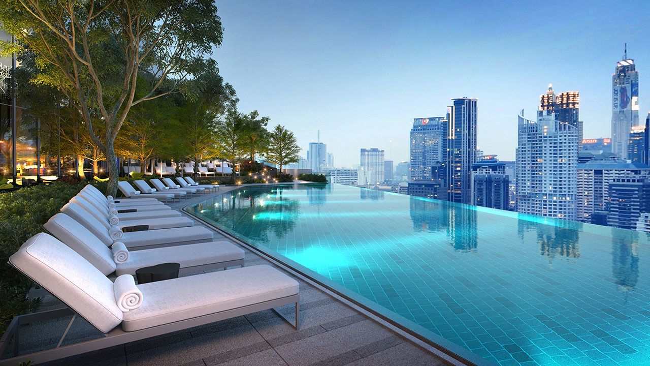 a pool with a city view