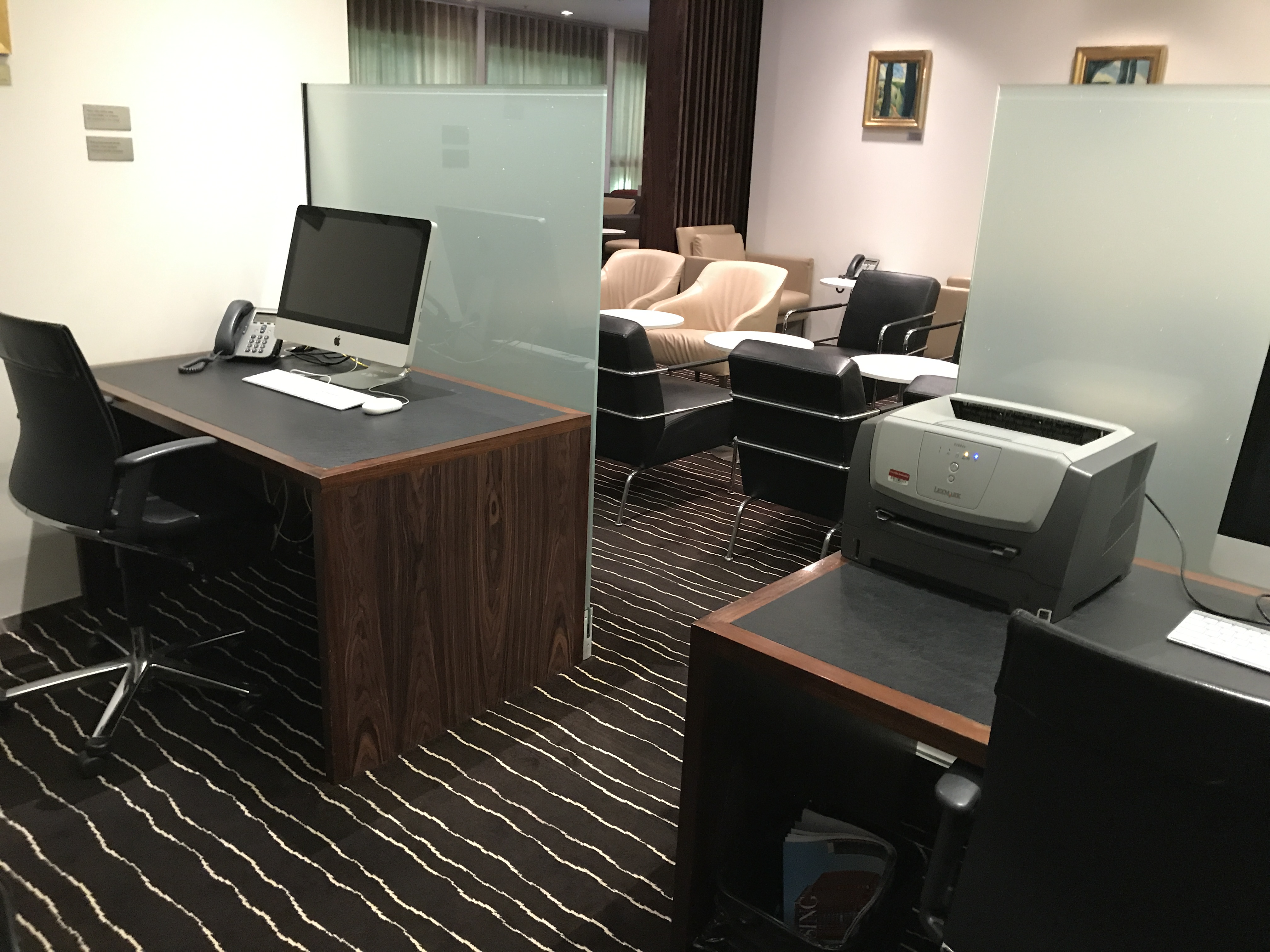 a room with desks and computers