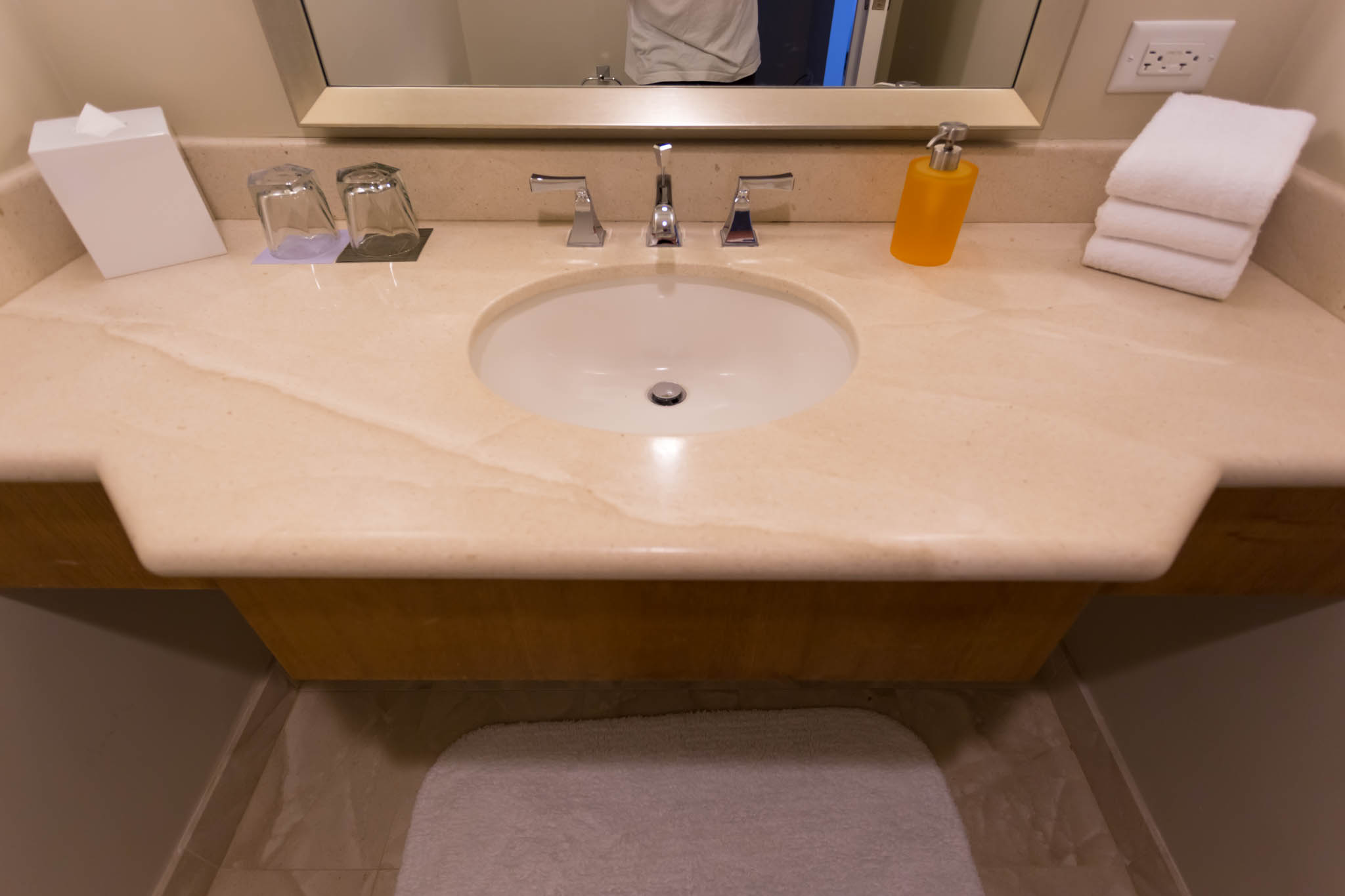 a sink with a towel on the counter