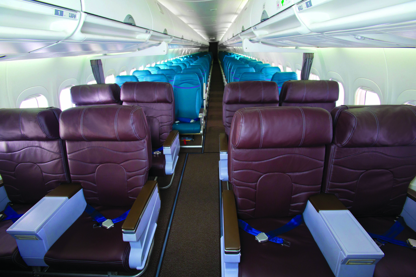 the inside of an airplane with seats