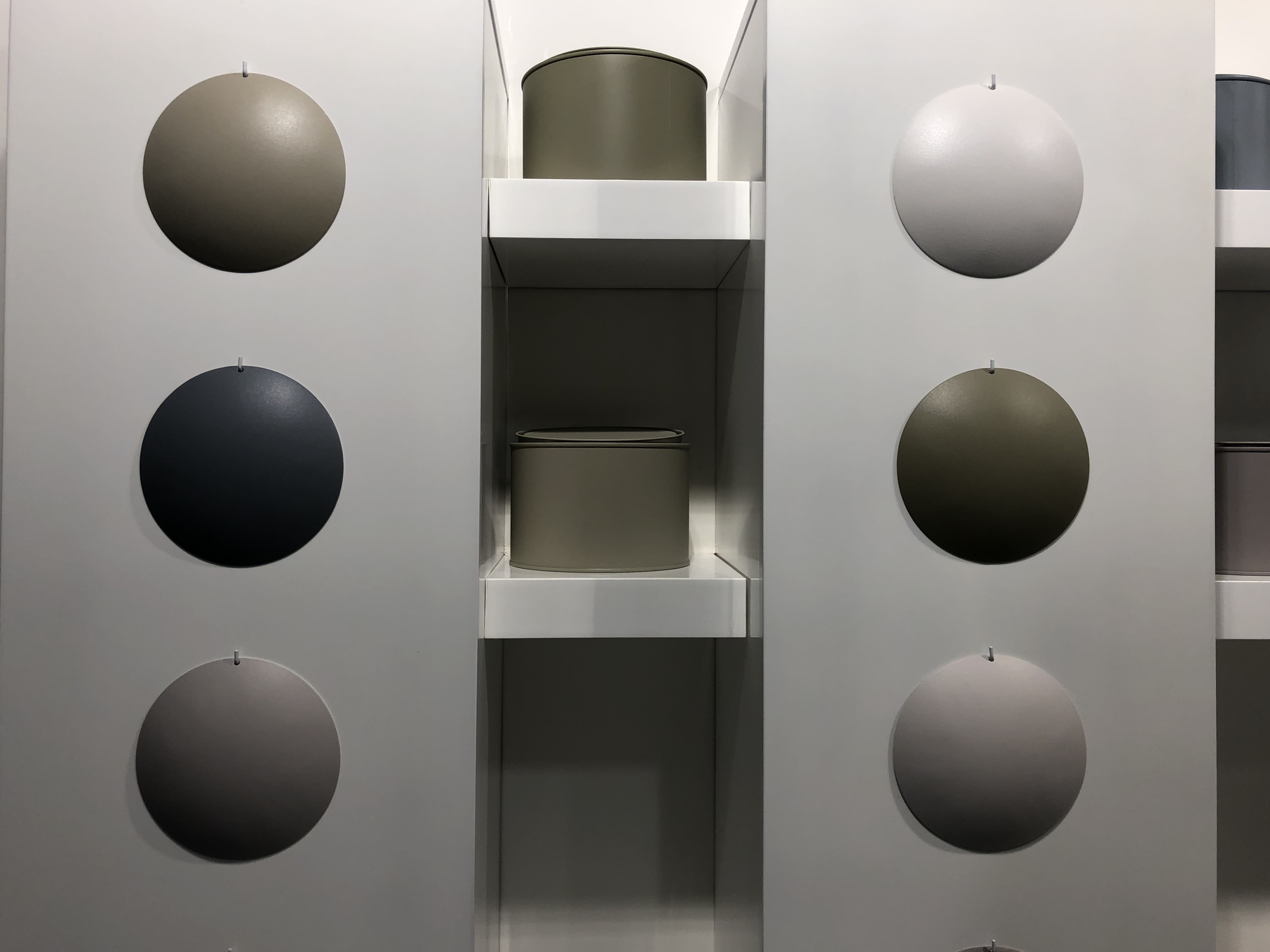a shelf with round objects on it
