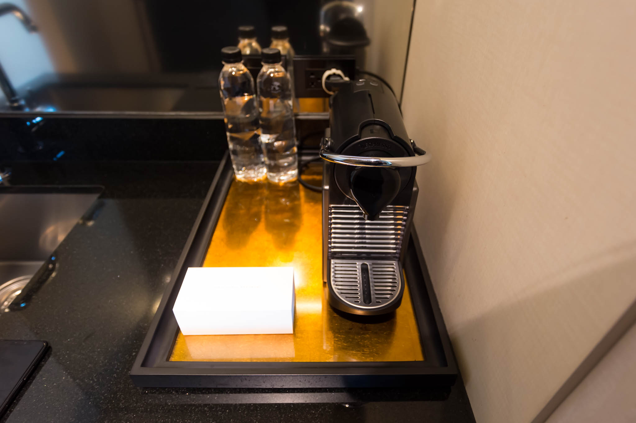 a coffee machine on a tray