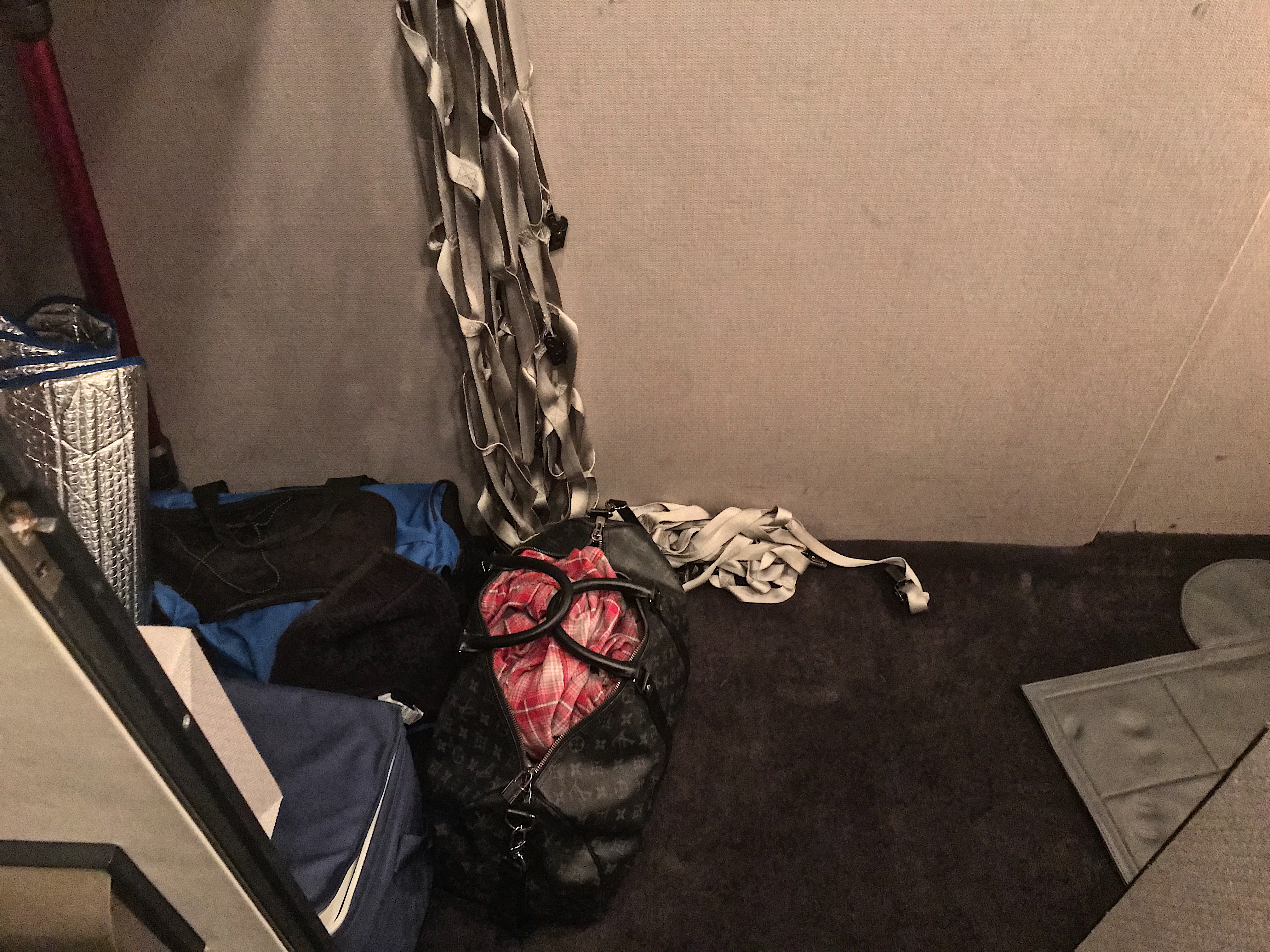 a bag and luggage in a room