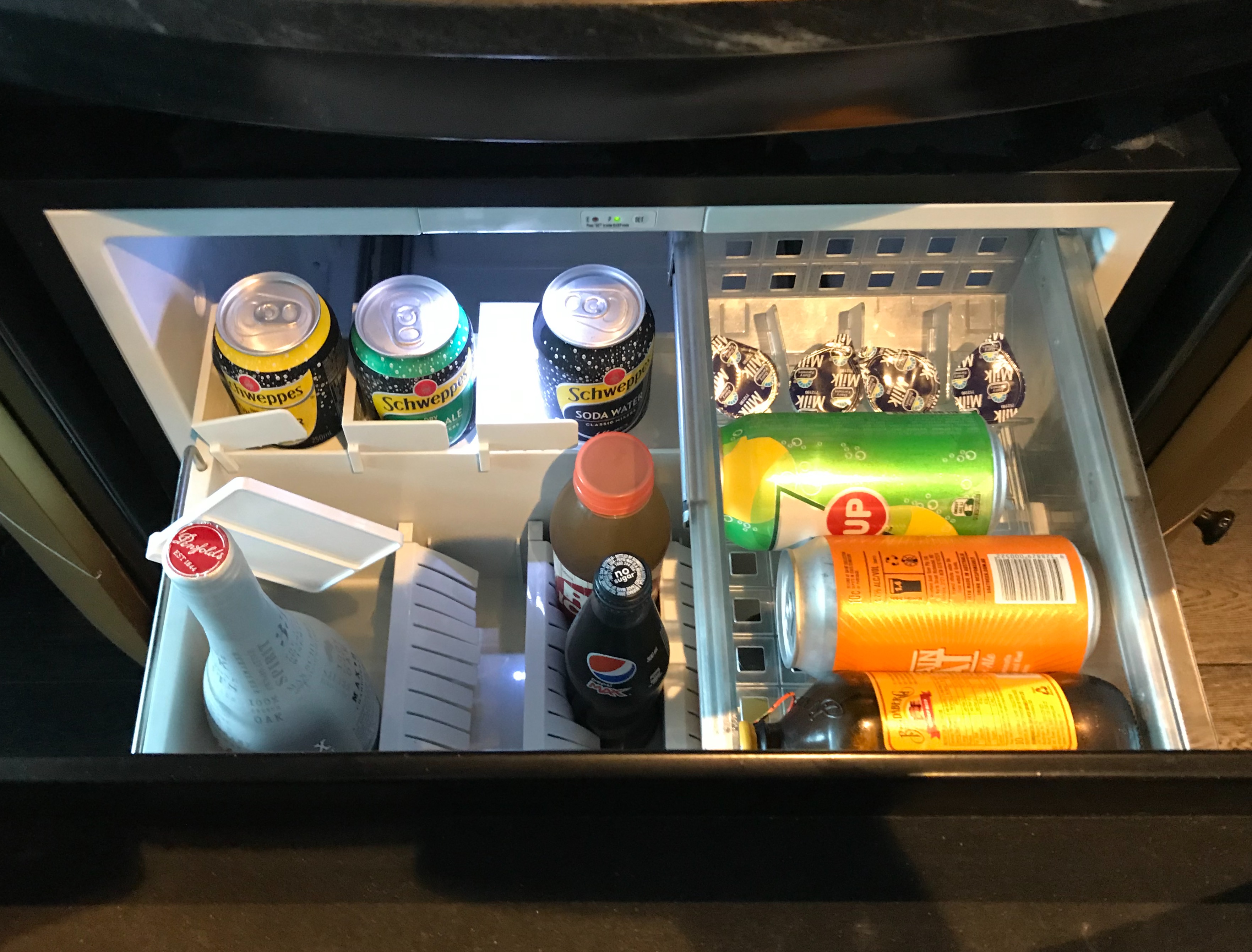 a refrigerator with drinks inside