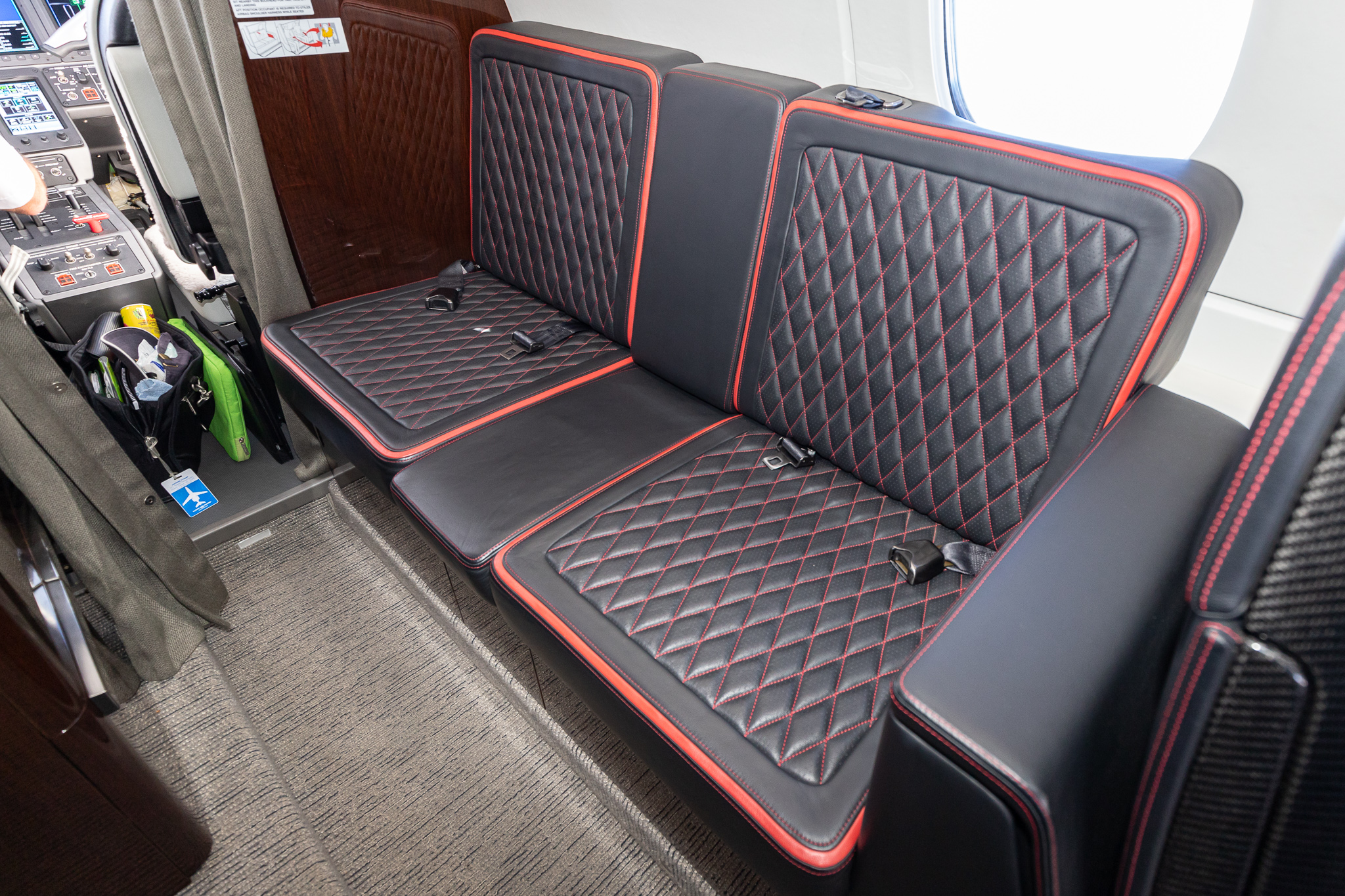 a black and red seats in a vehicle