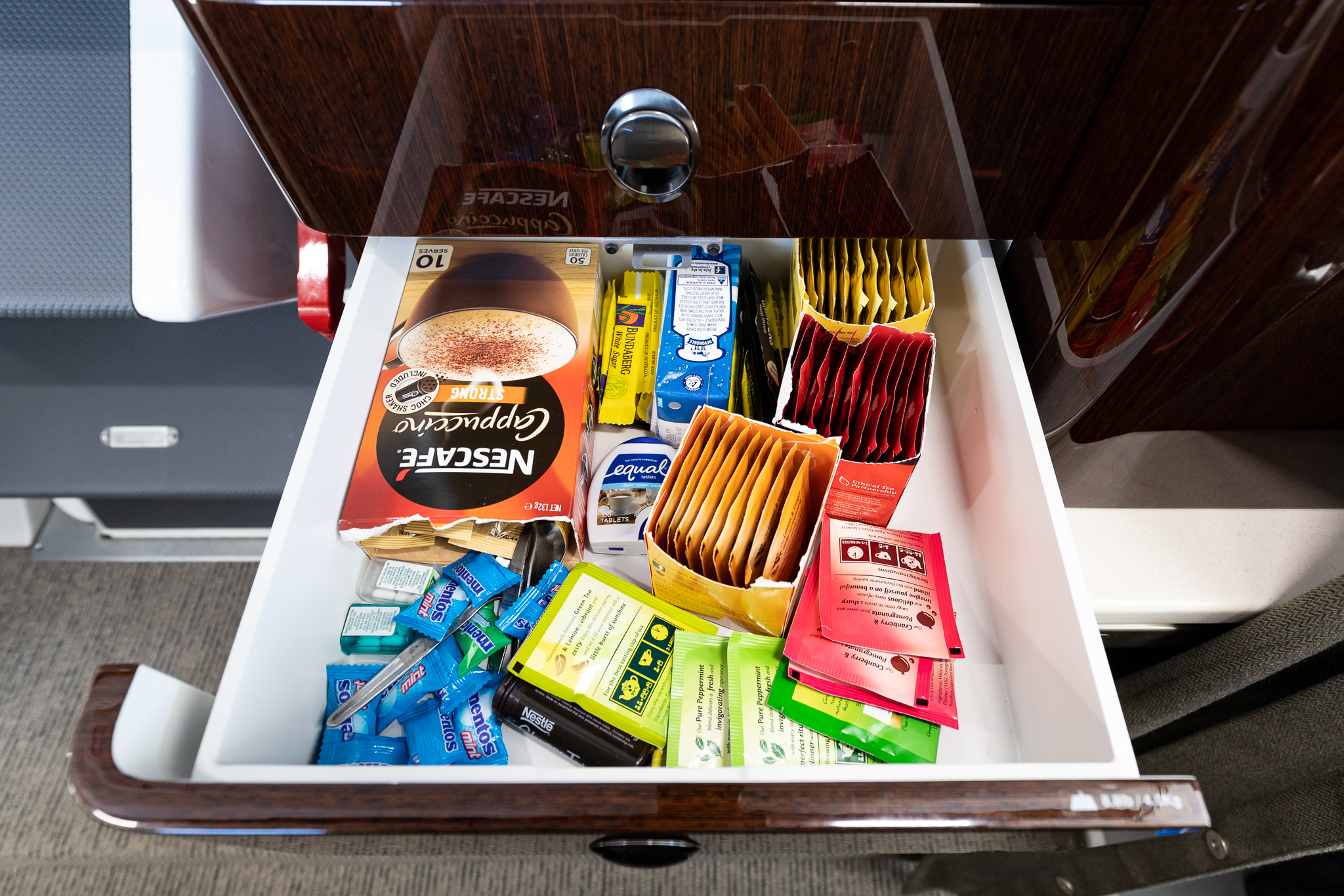 a drawer with a variety of food items