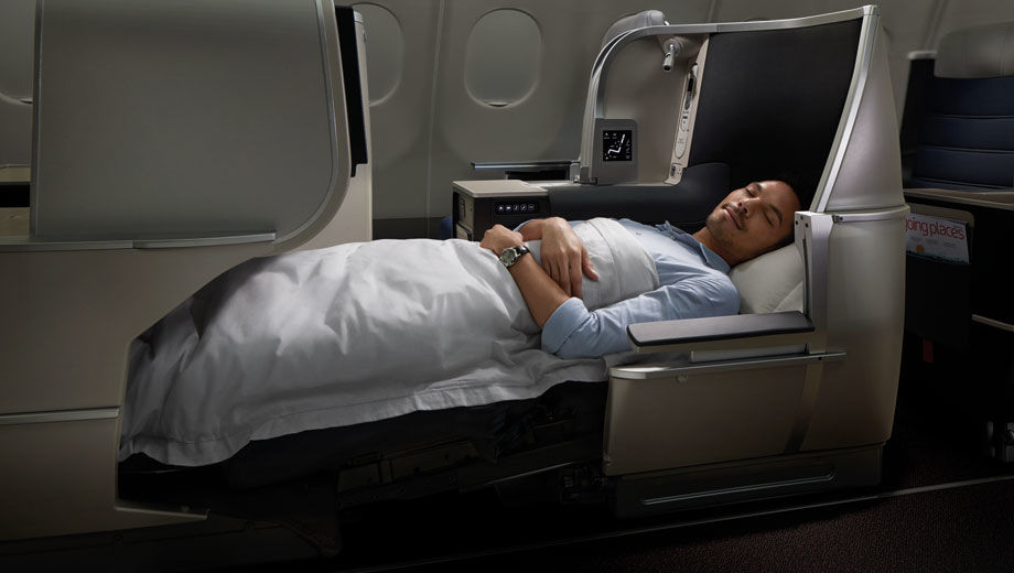 a man sleeping in an airplane