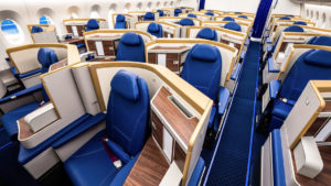 a row of blue and white seats