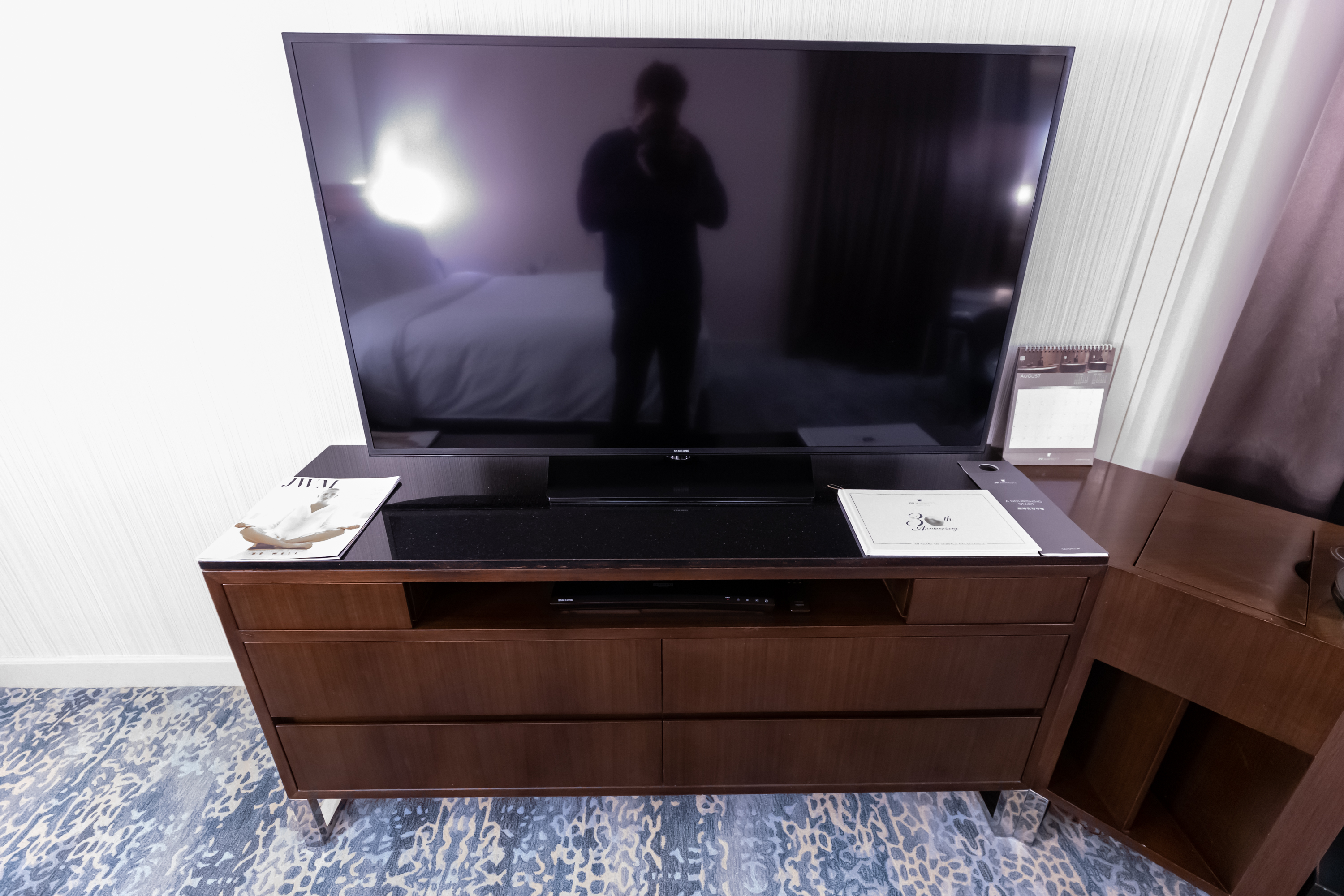 a tv on a dresser