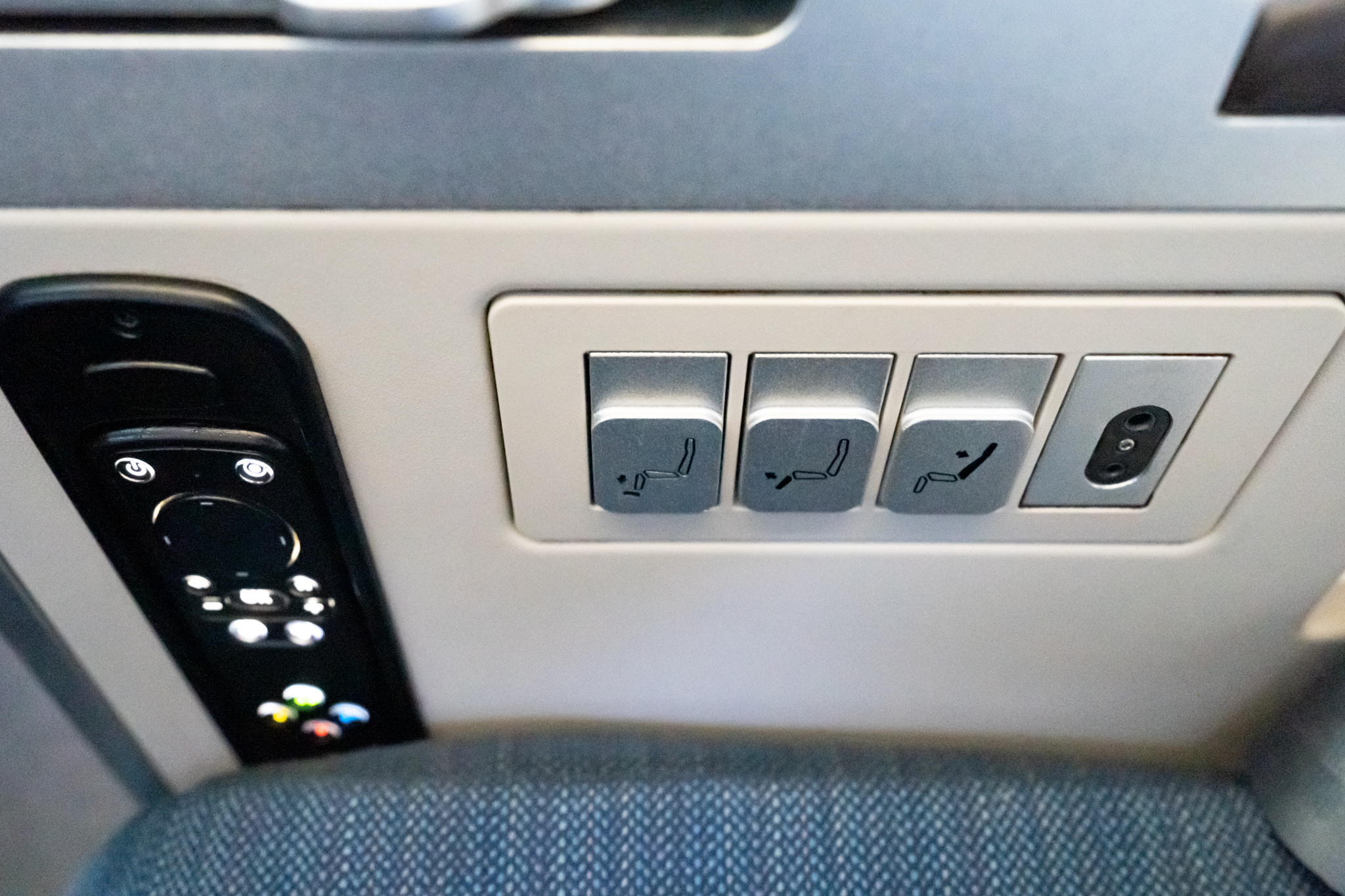 a seat buttons and switches in a seat