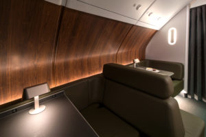 a table and chair in a plane