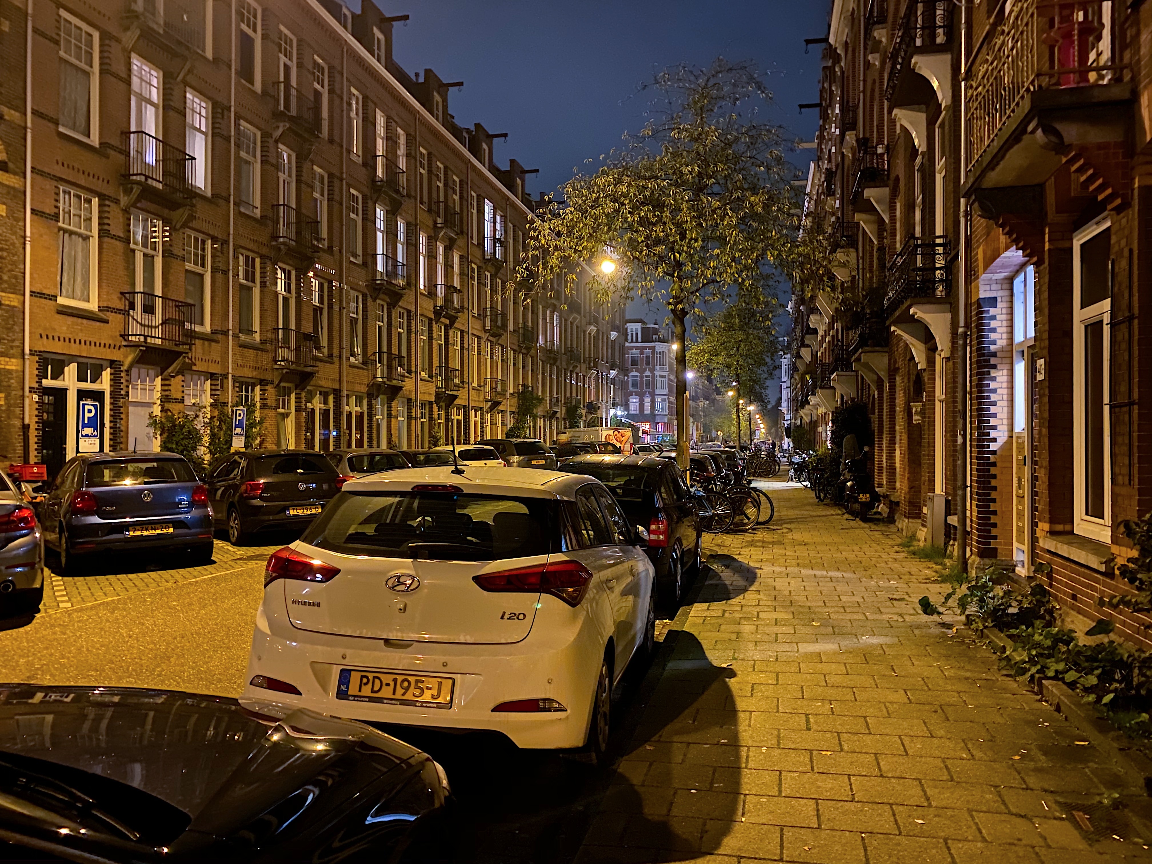 a street with cars parked on it