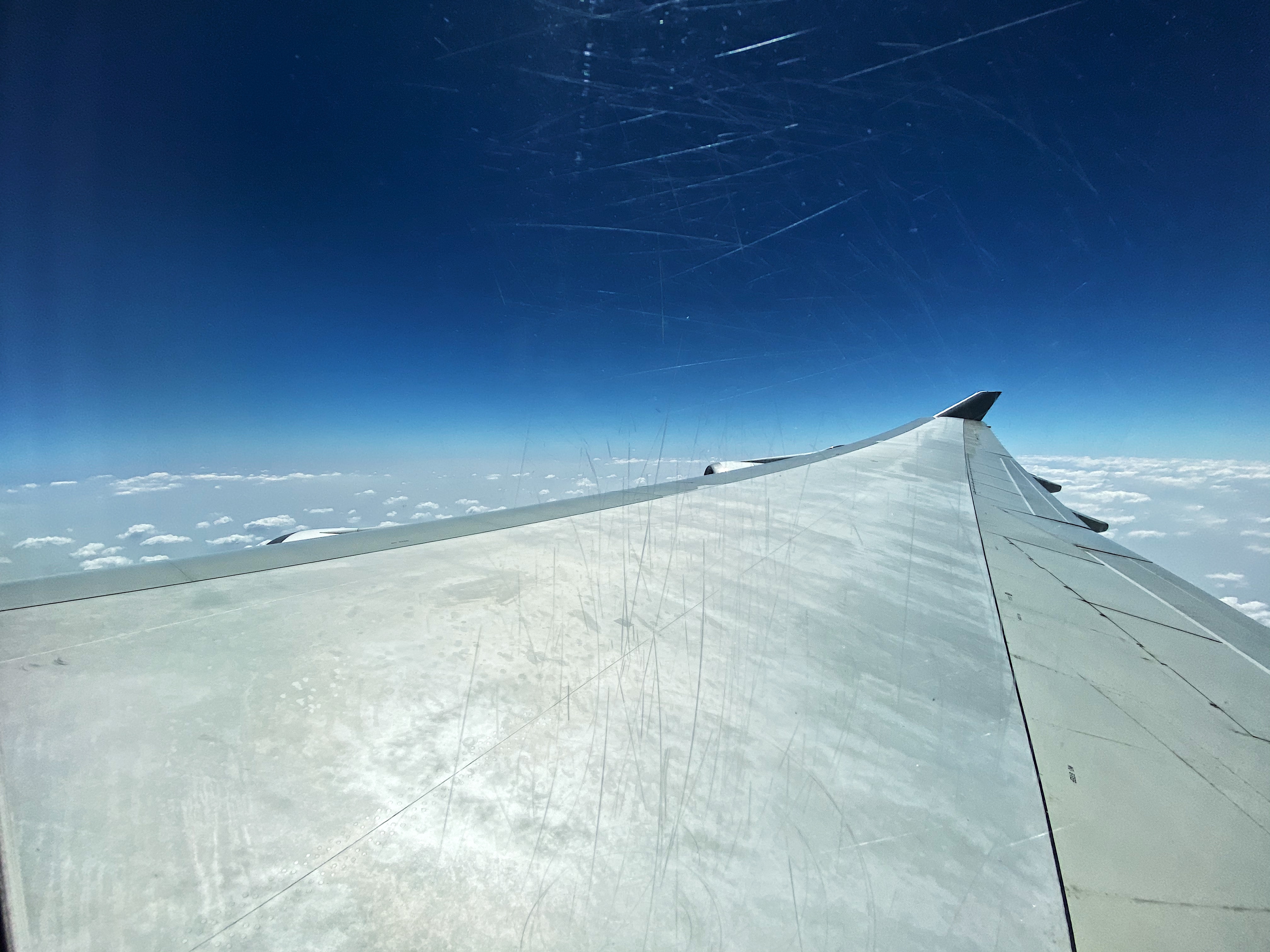 wing of an airplane in the sky