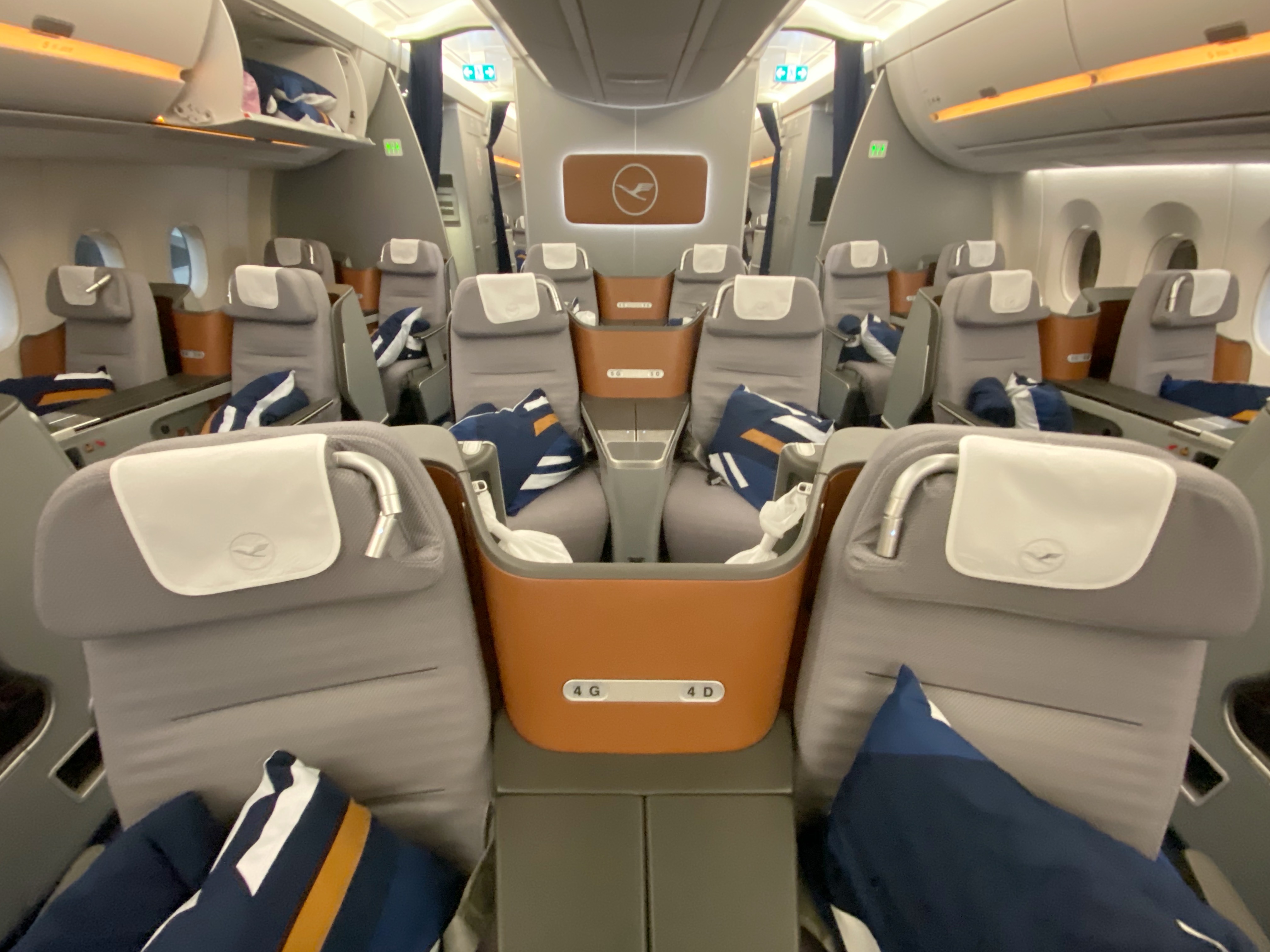 the inside of an airplane with many seats