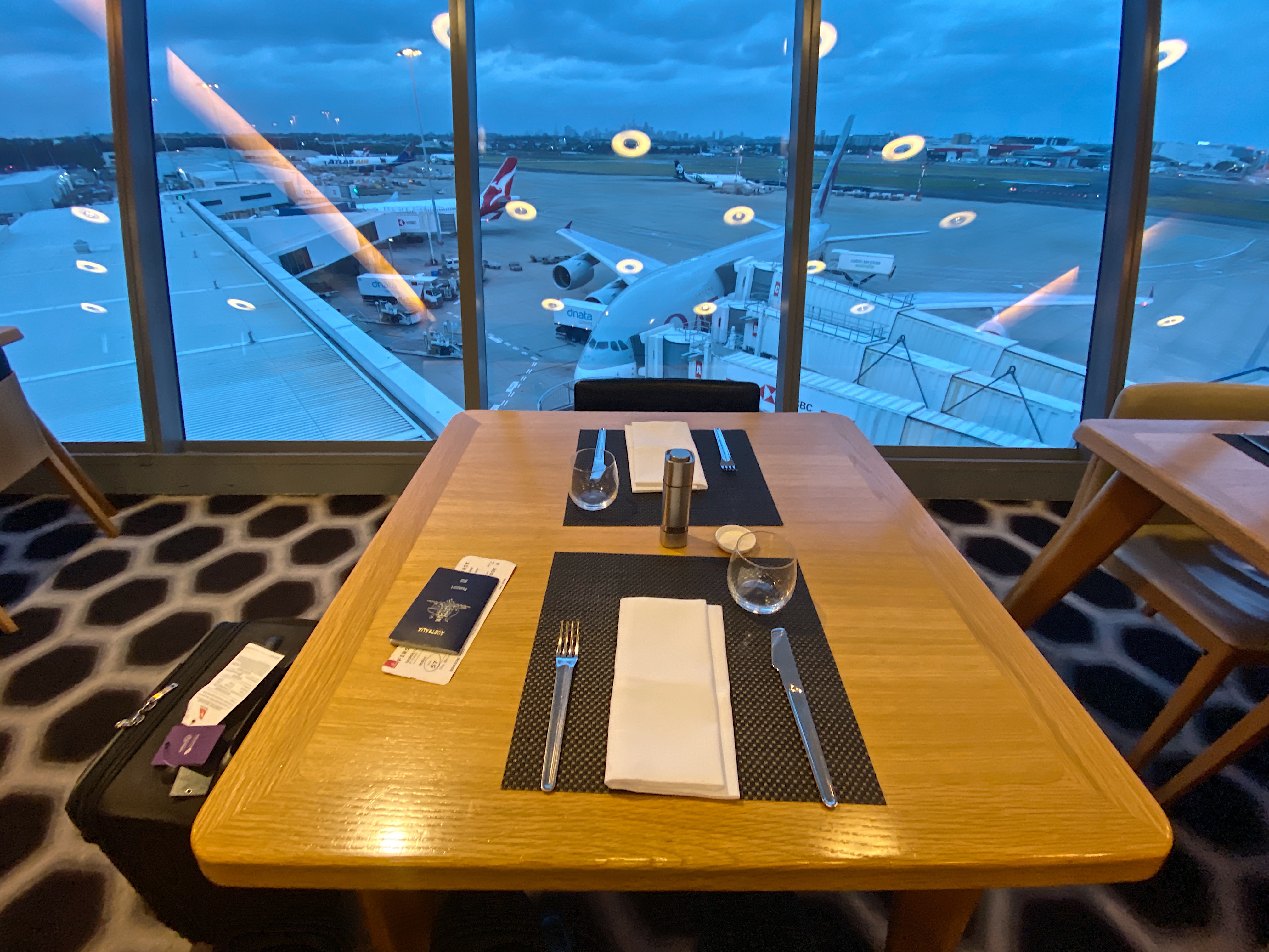 a table with a view of planes and airplanes in the background
