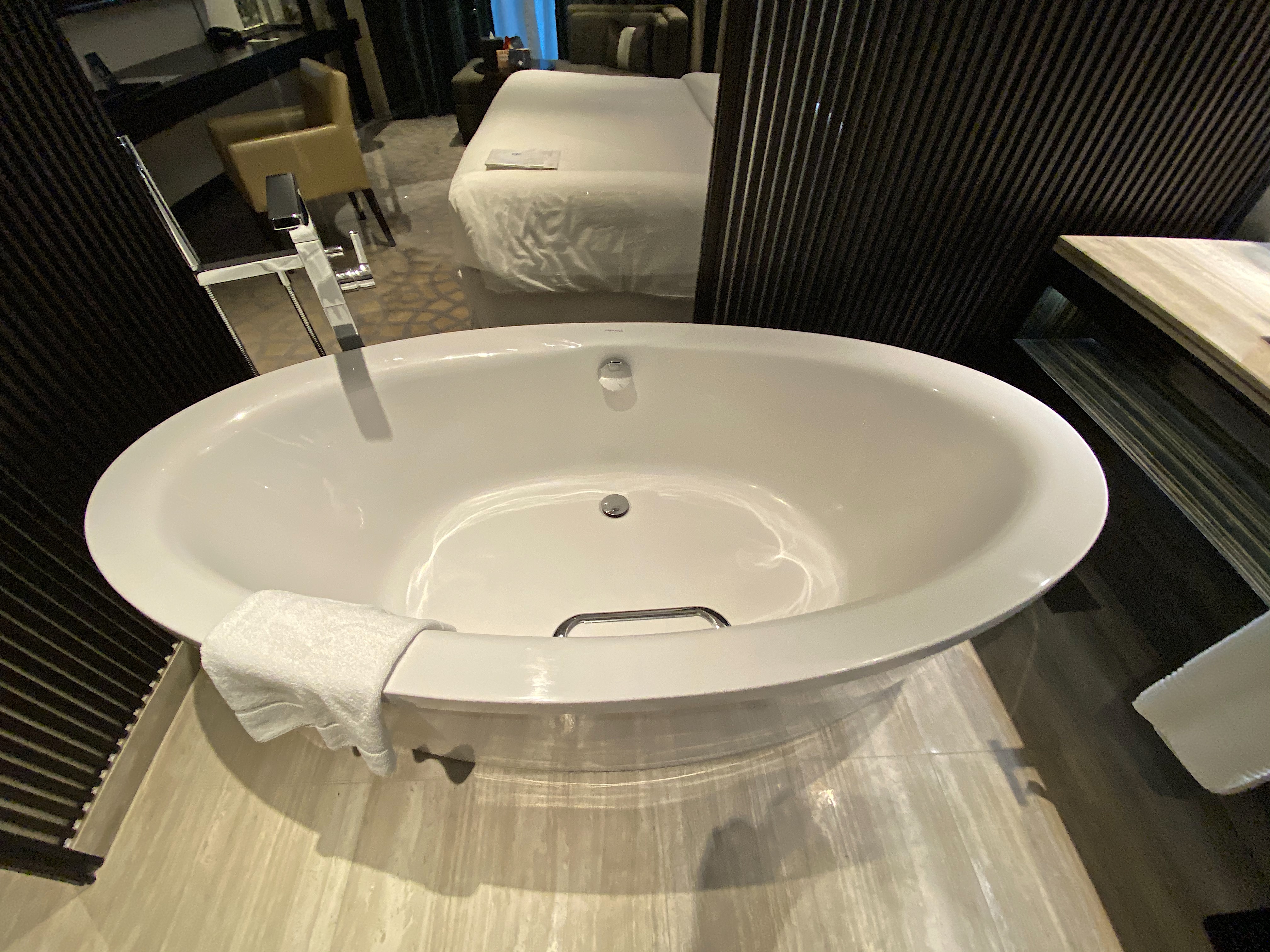a white bathtub in a room
