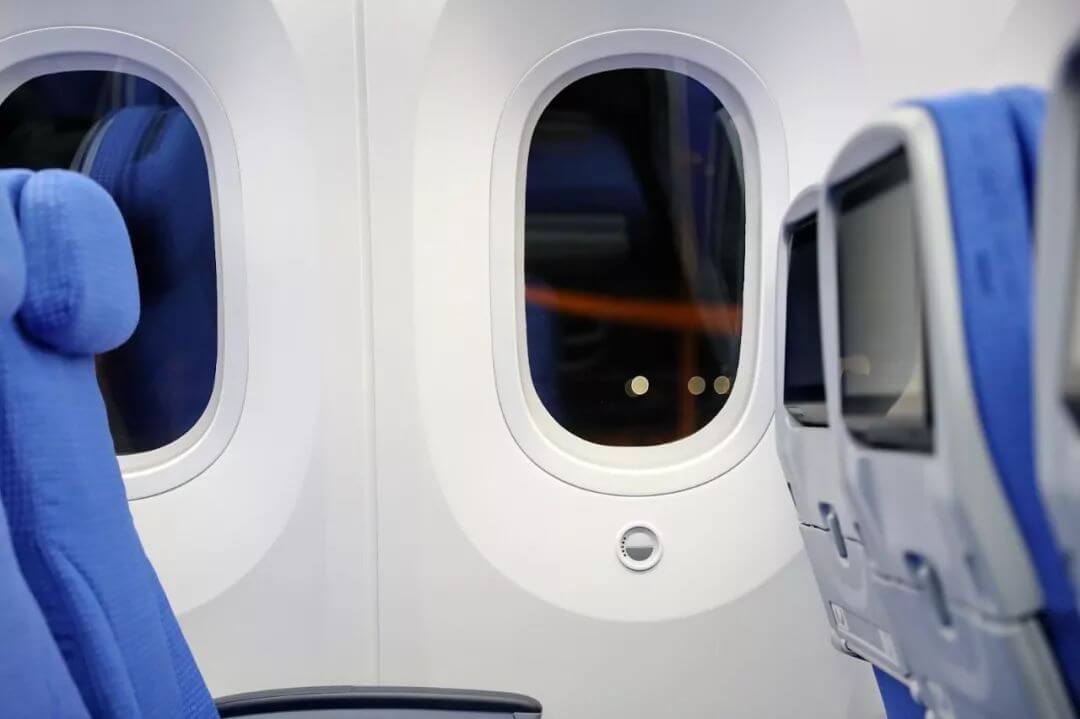 a row of windows in an airplane