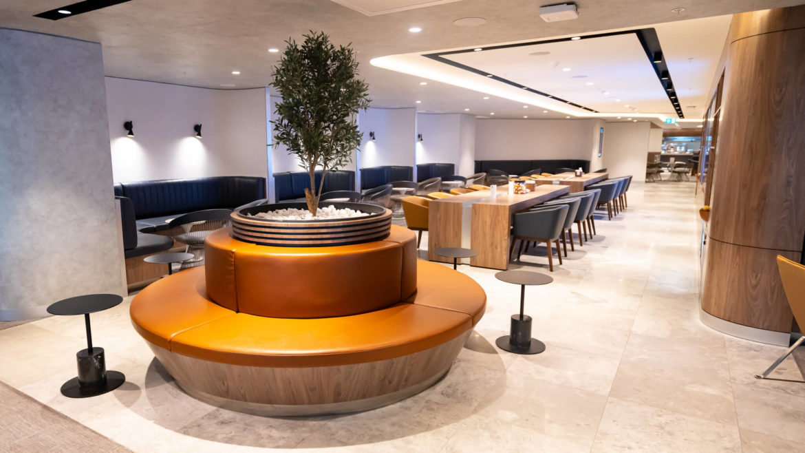 American Express Lounge-28 a room with a tree in it