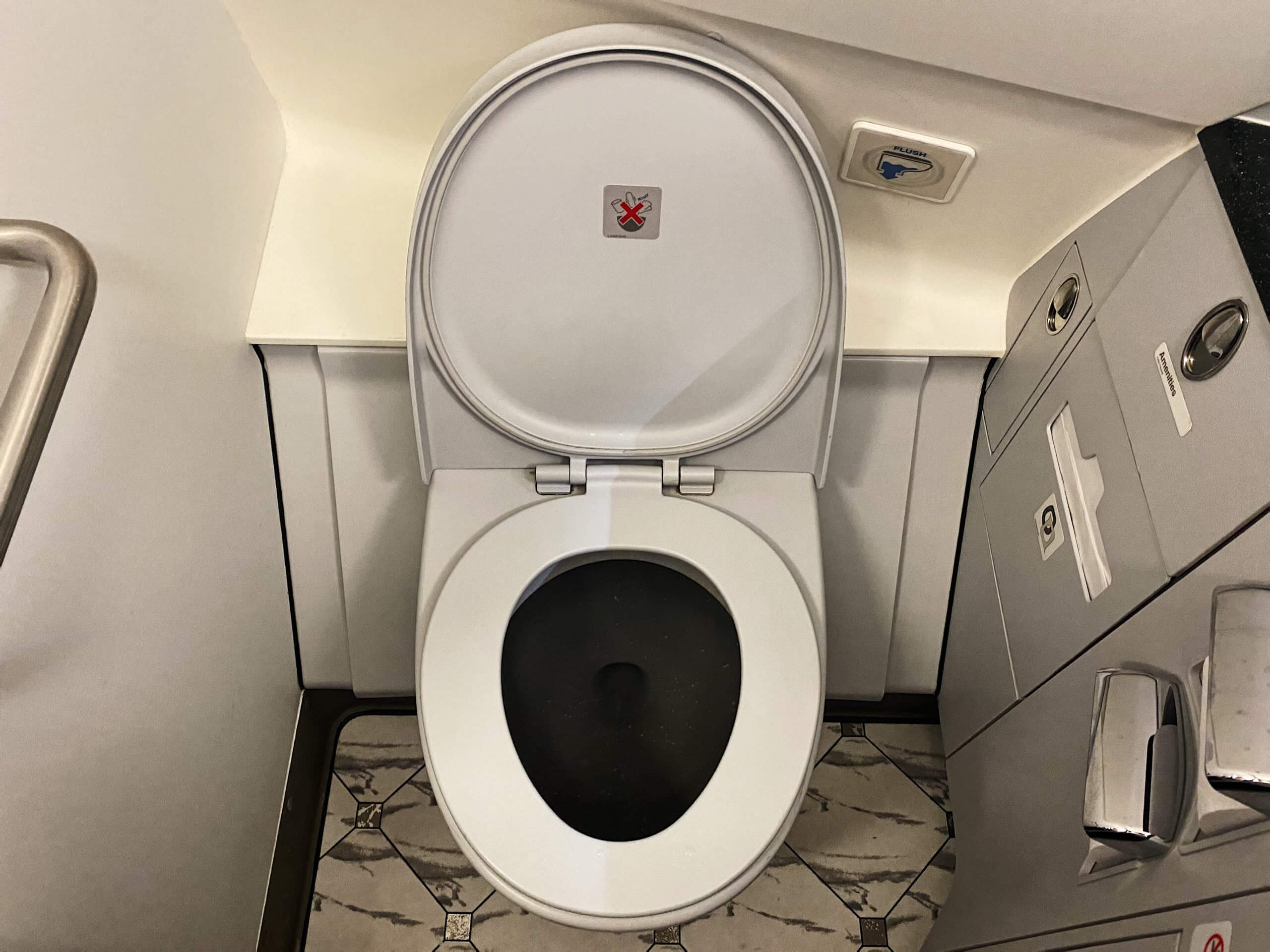 a toilet with a lid up