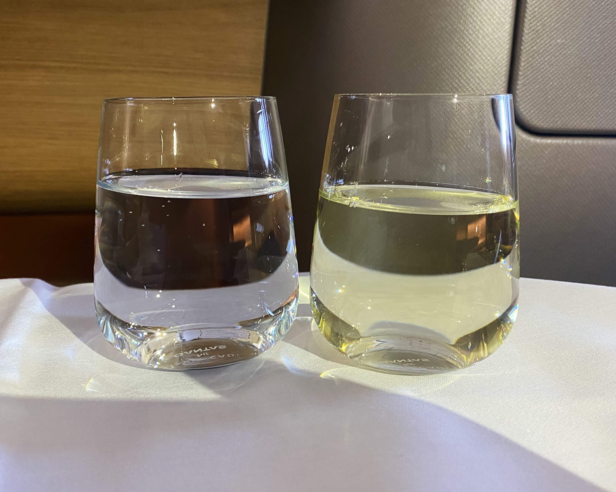 two glasses of water on a table